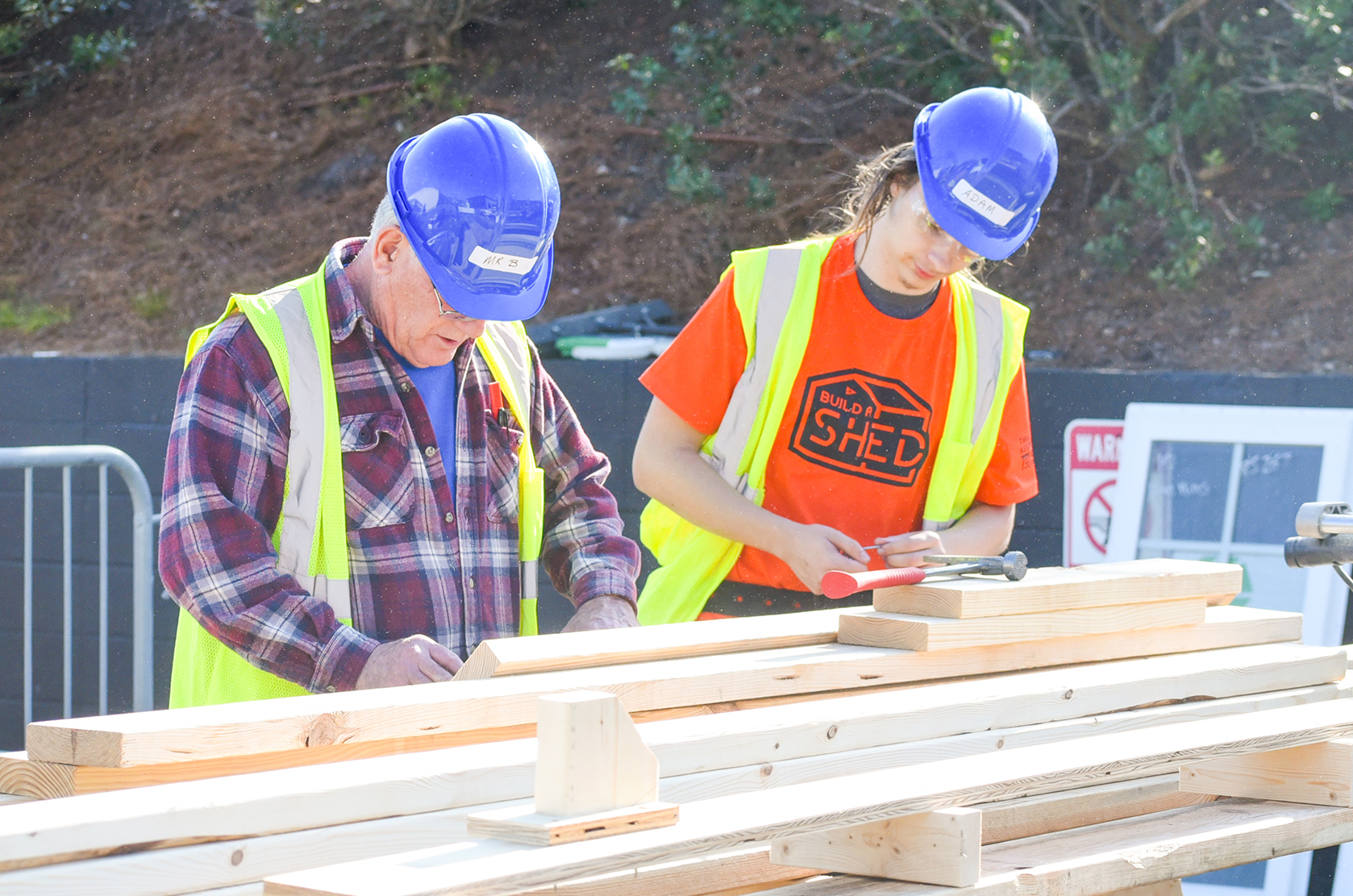 students building shed