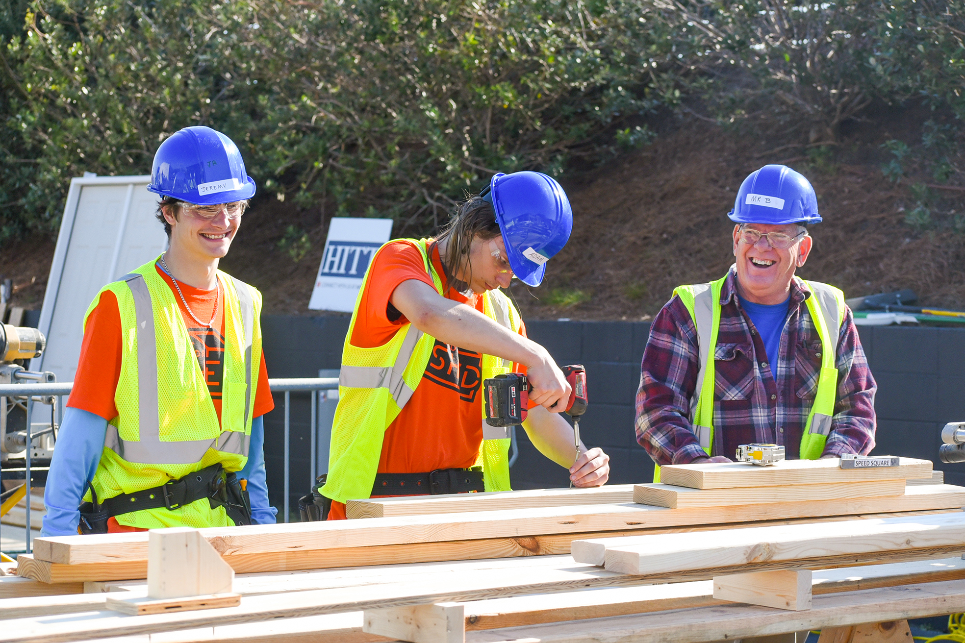 students building shed