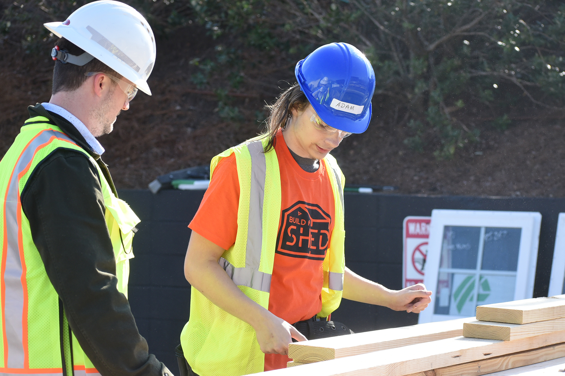 students building shed