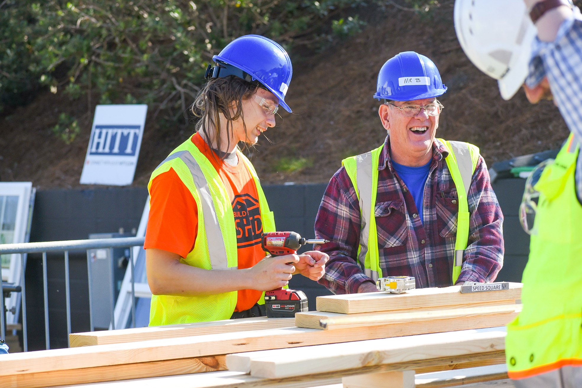 students building shed