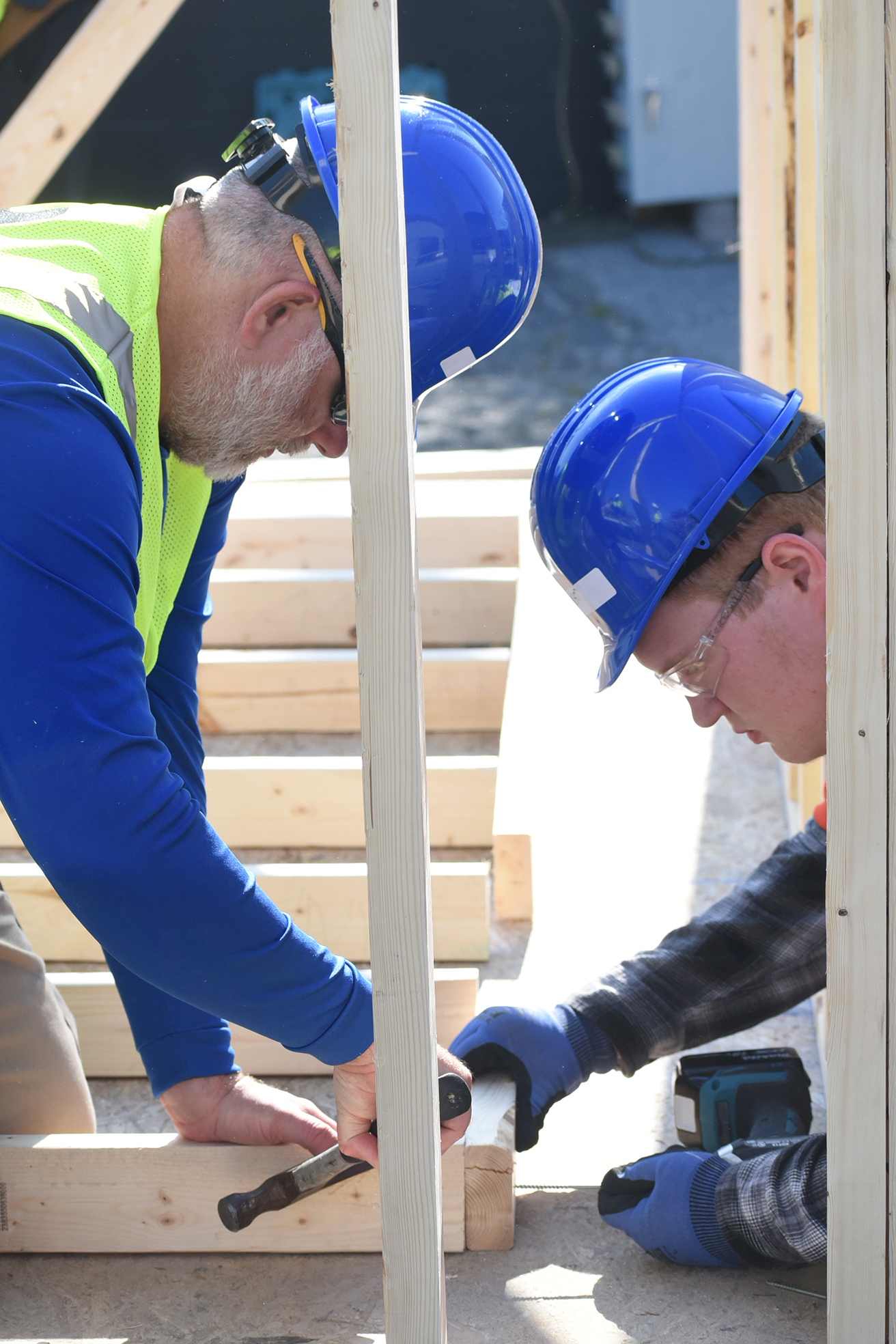 students building shed