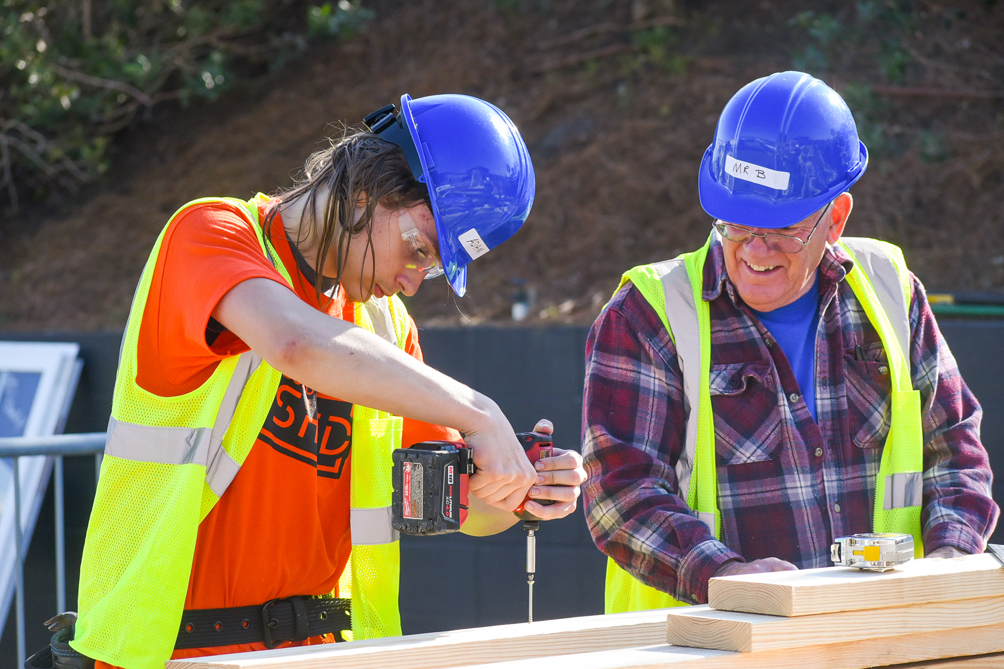 students building shed