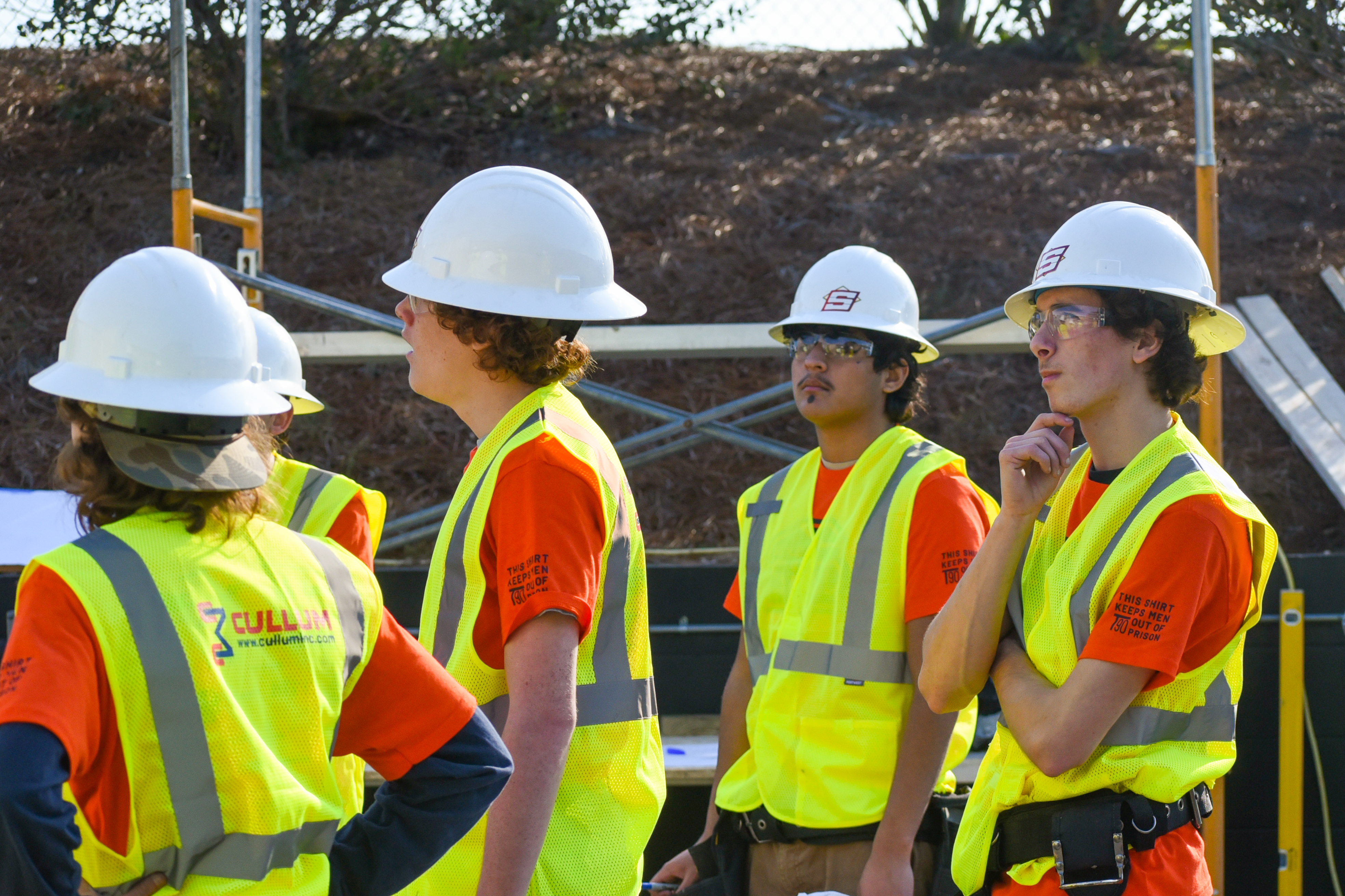 students building shed