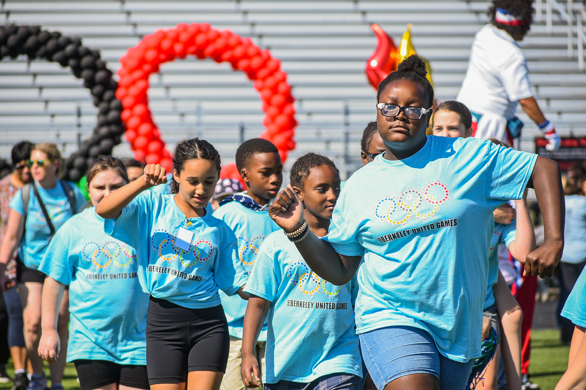 students and staff in parade