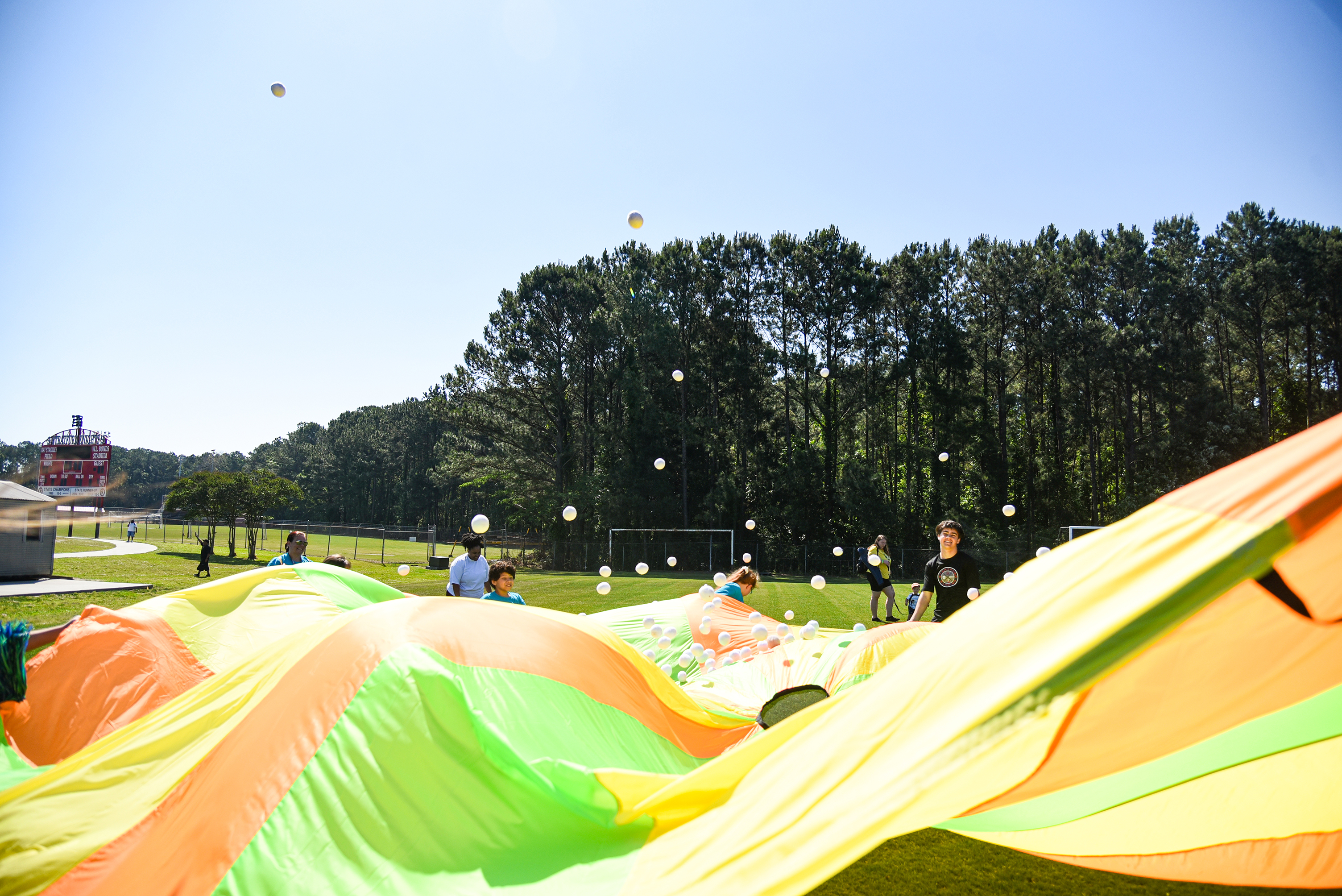 GCE playing parachutes
