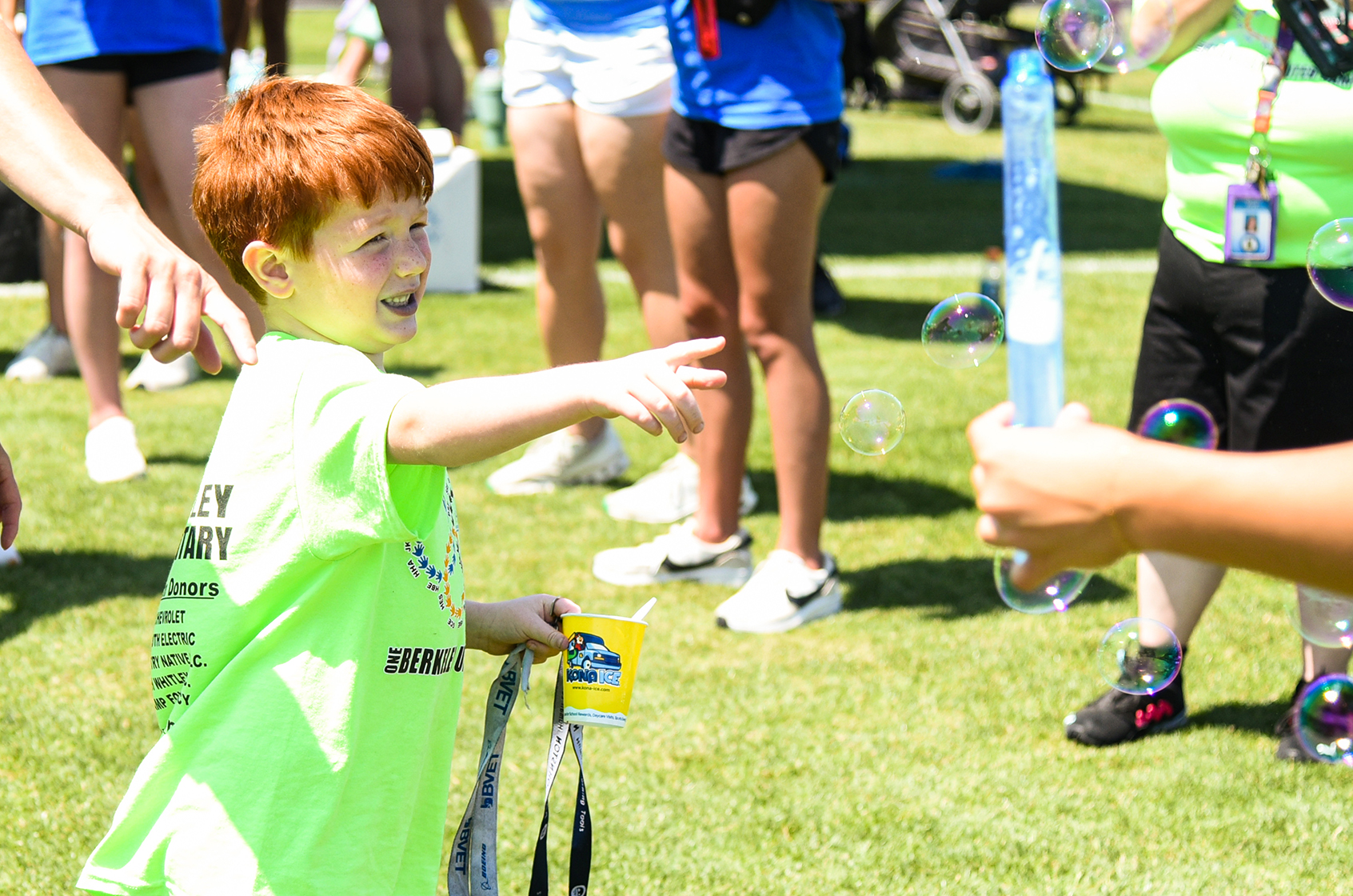 BES student chasing bubbles