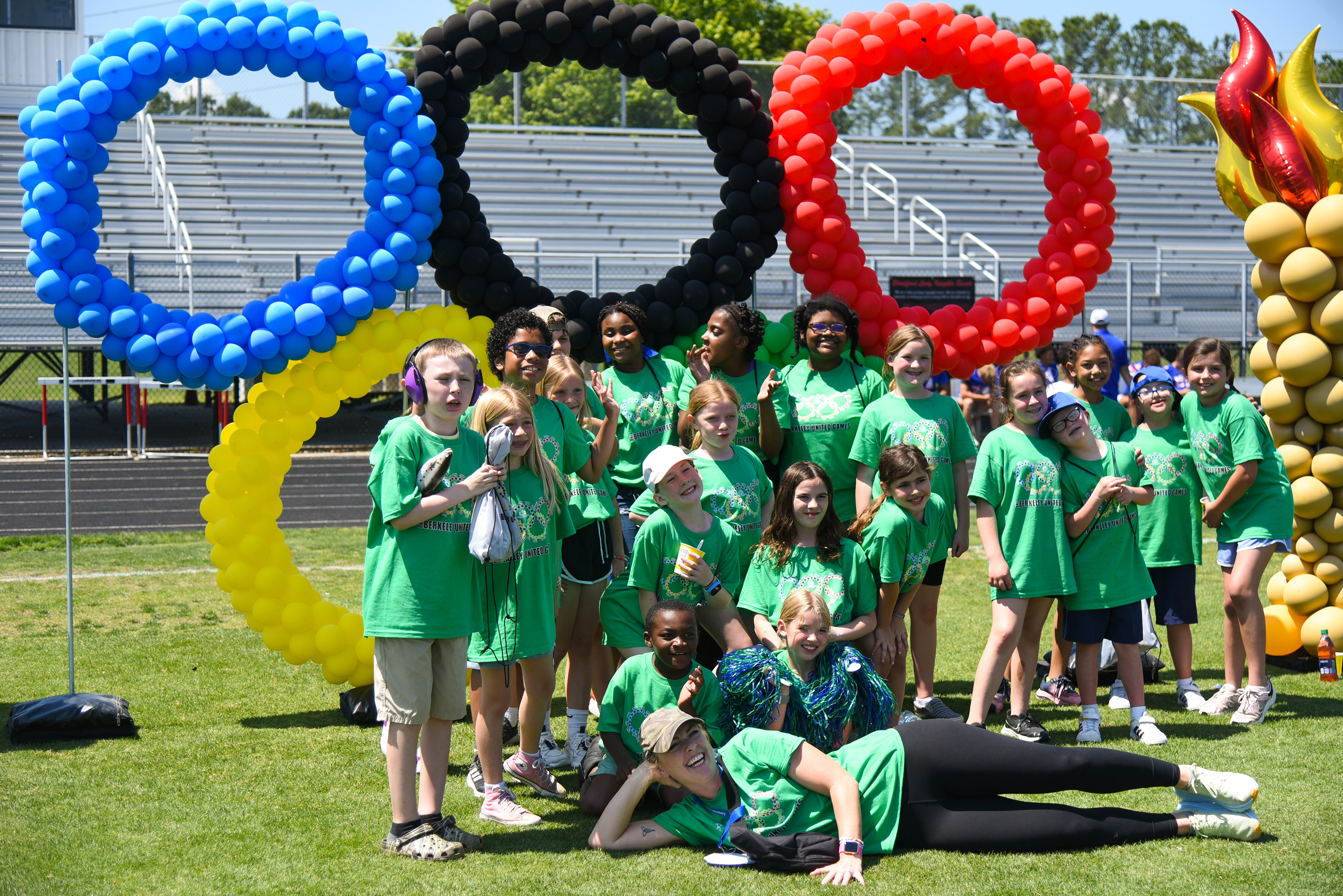 olympic rings with NES group shot