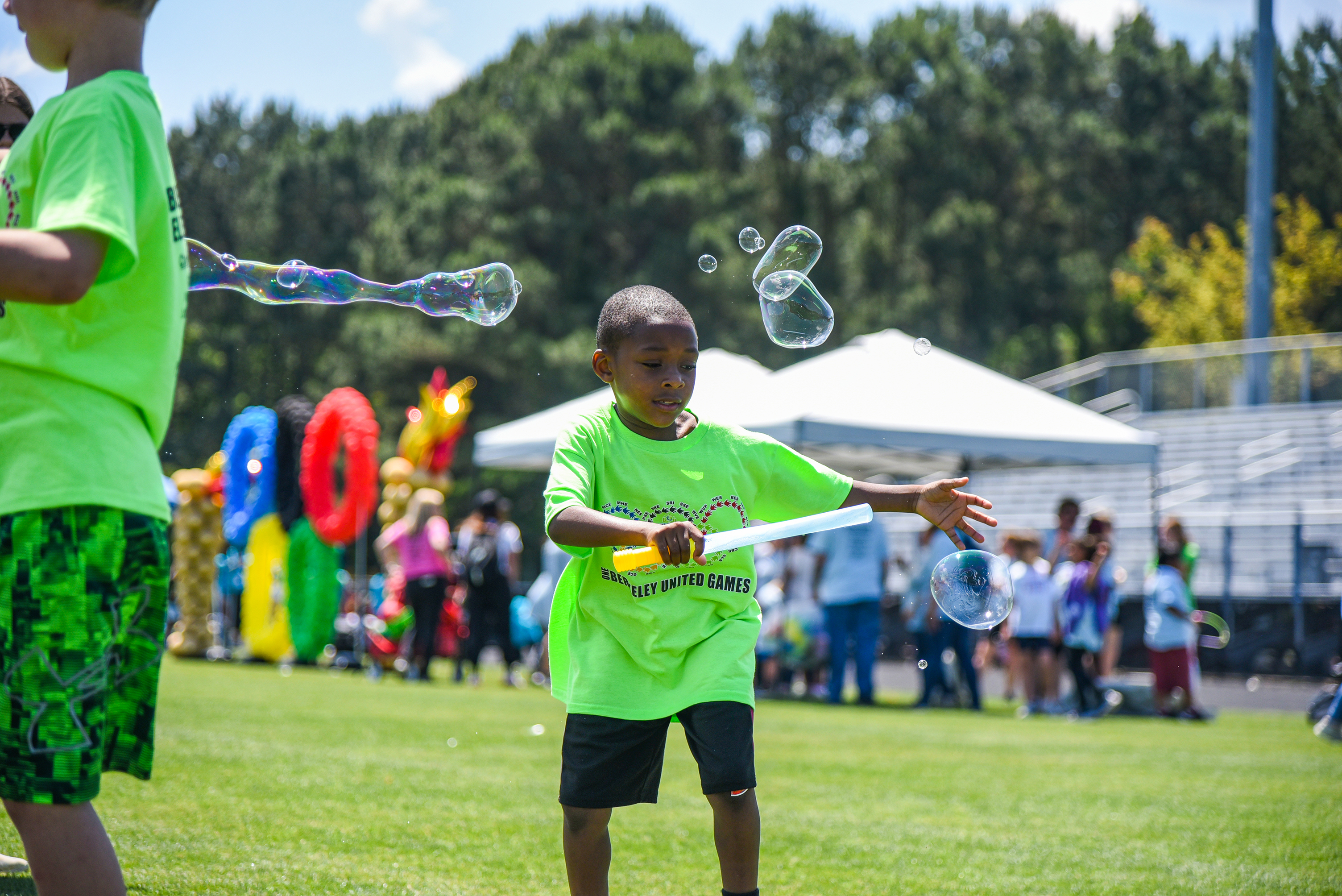 BES student playing with bubbles