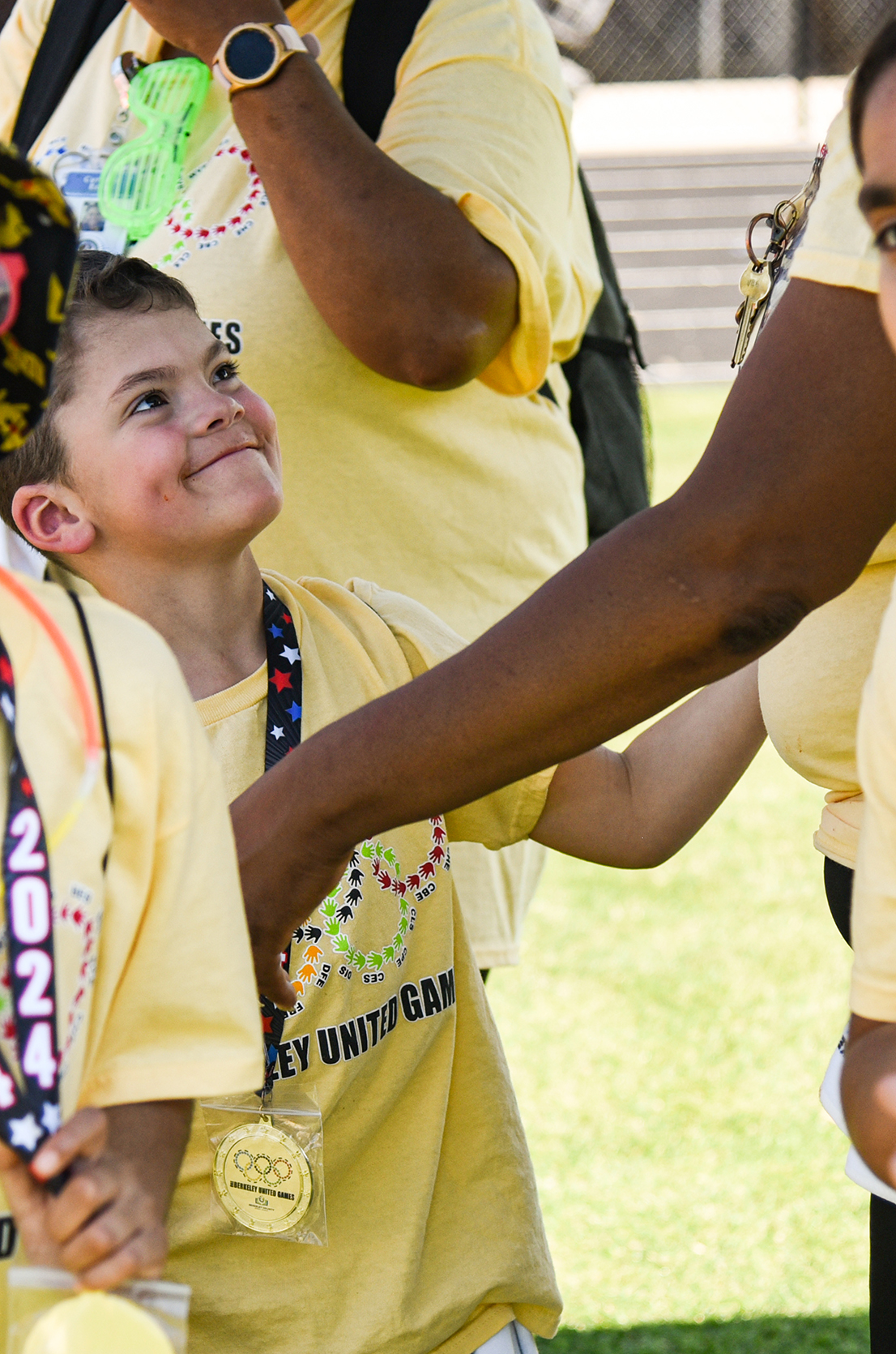 CPE student smiling up at teacher