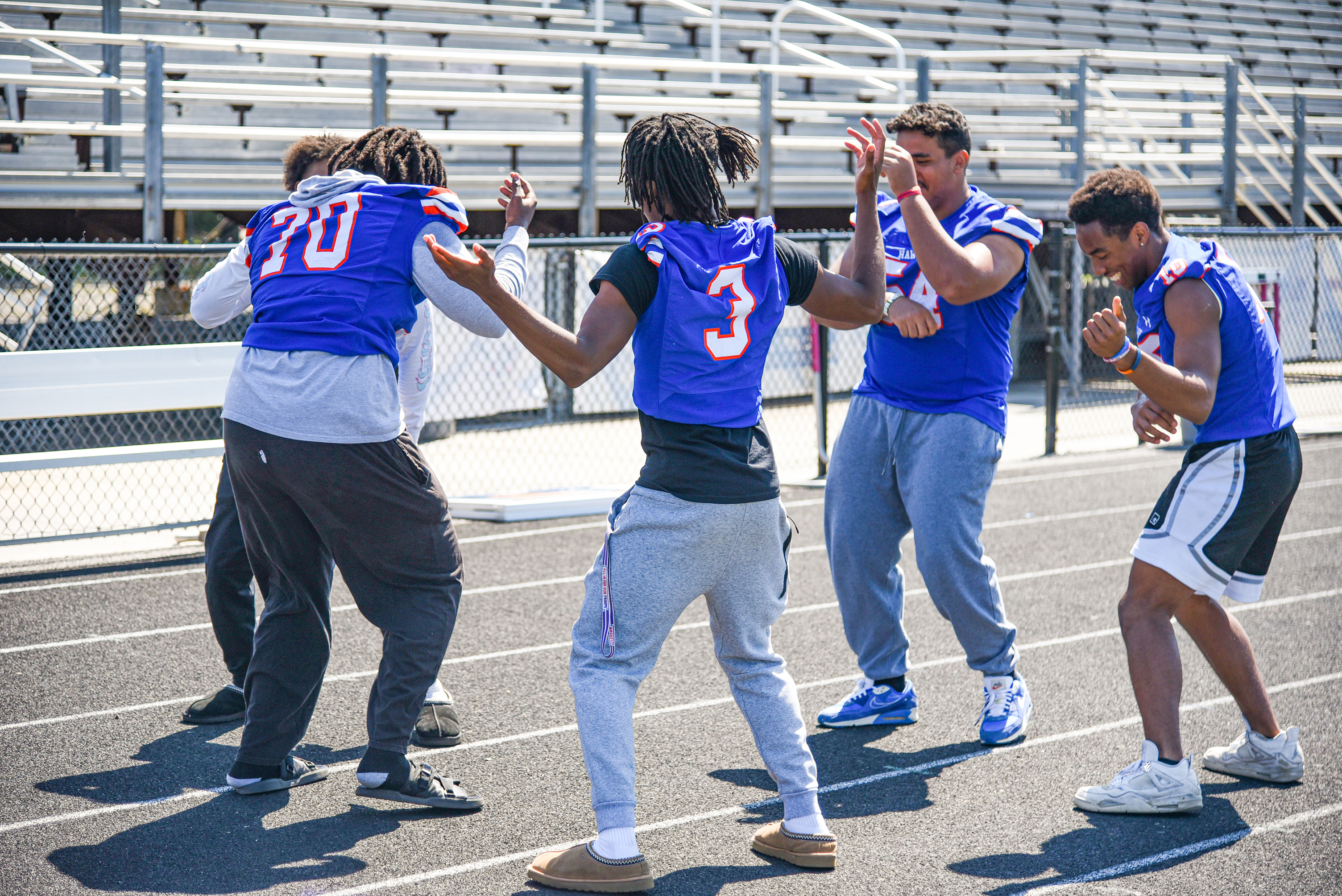 football players dancing