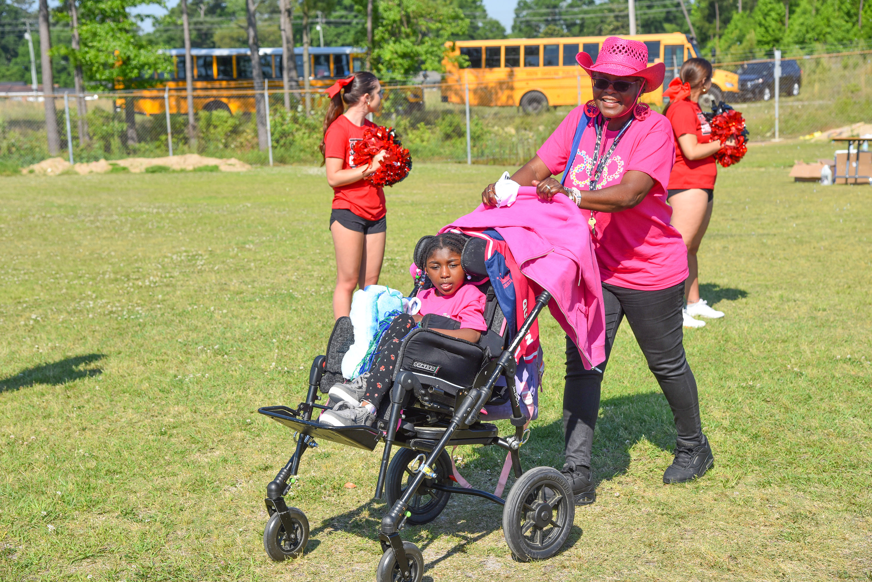 SSE teacher with student in wheelchair
