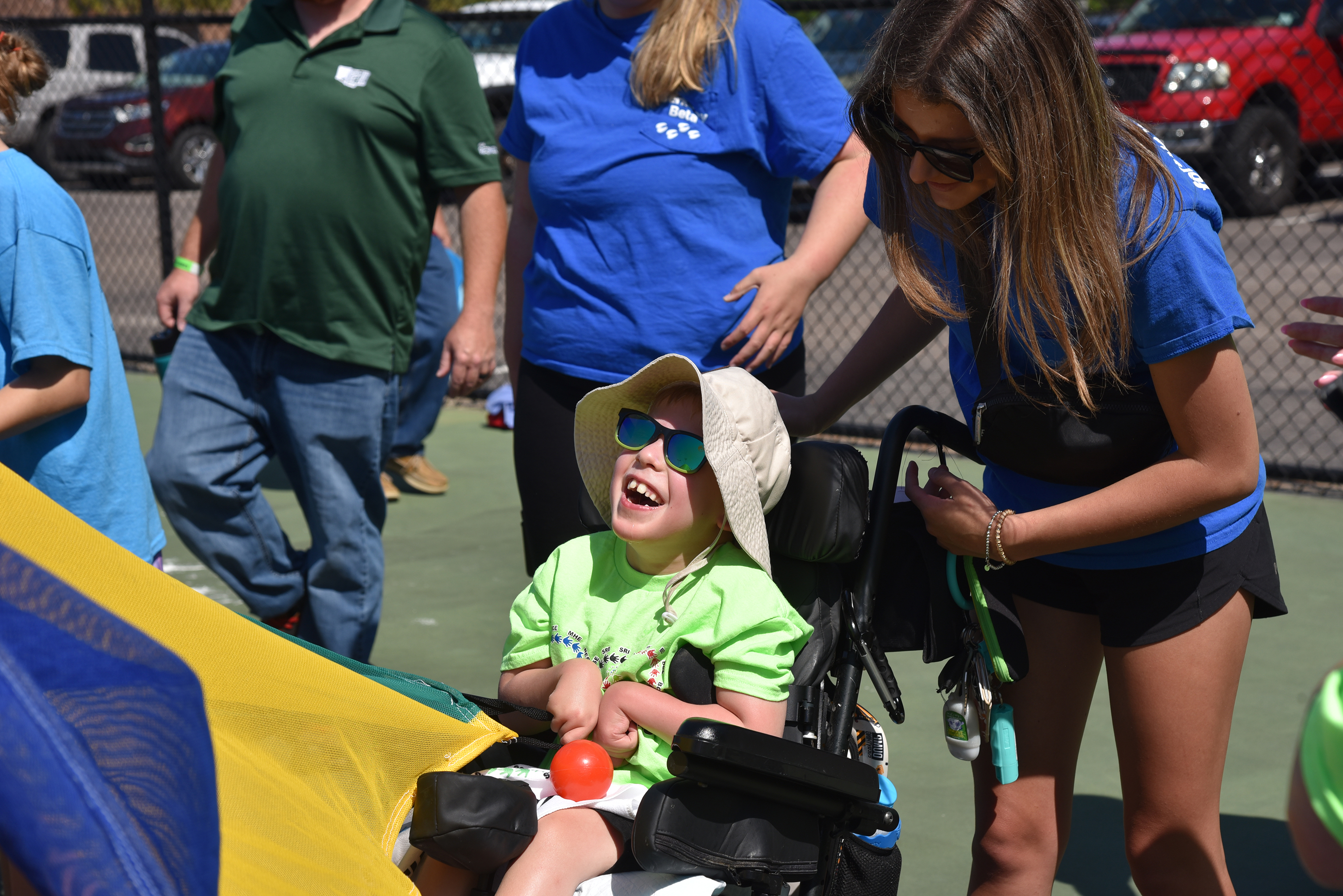 boy in wheelchair smiling