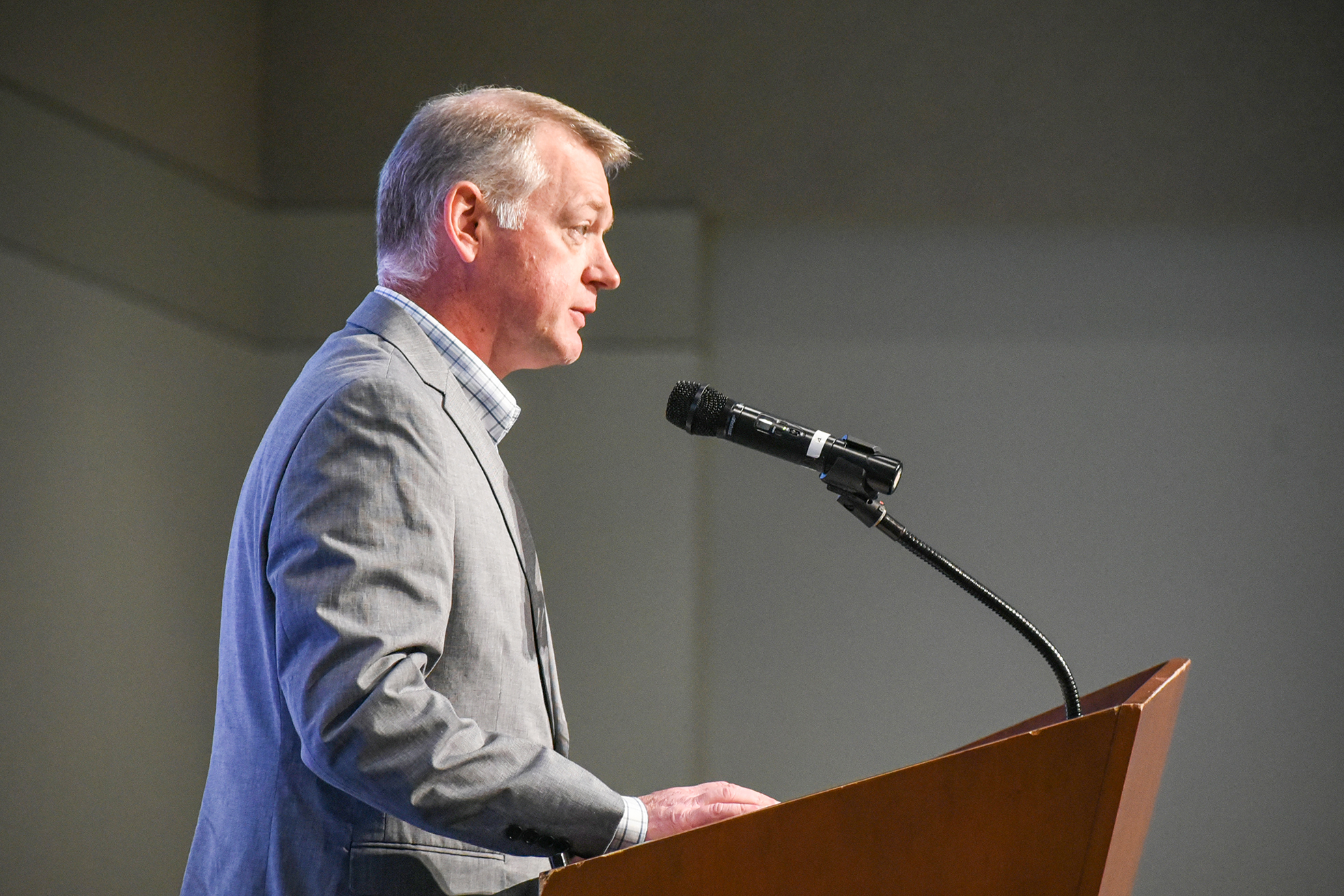 man chamber member at podium