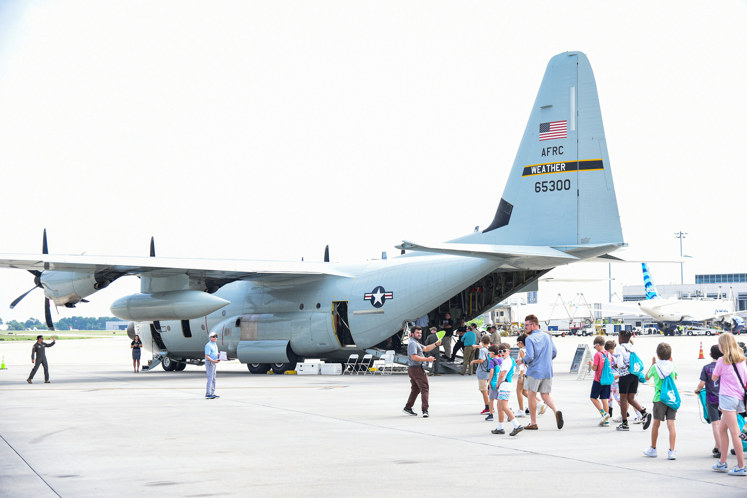 students walking up to plane
