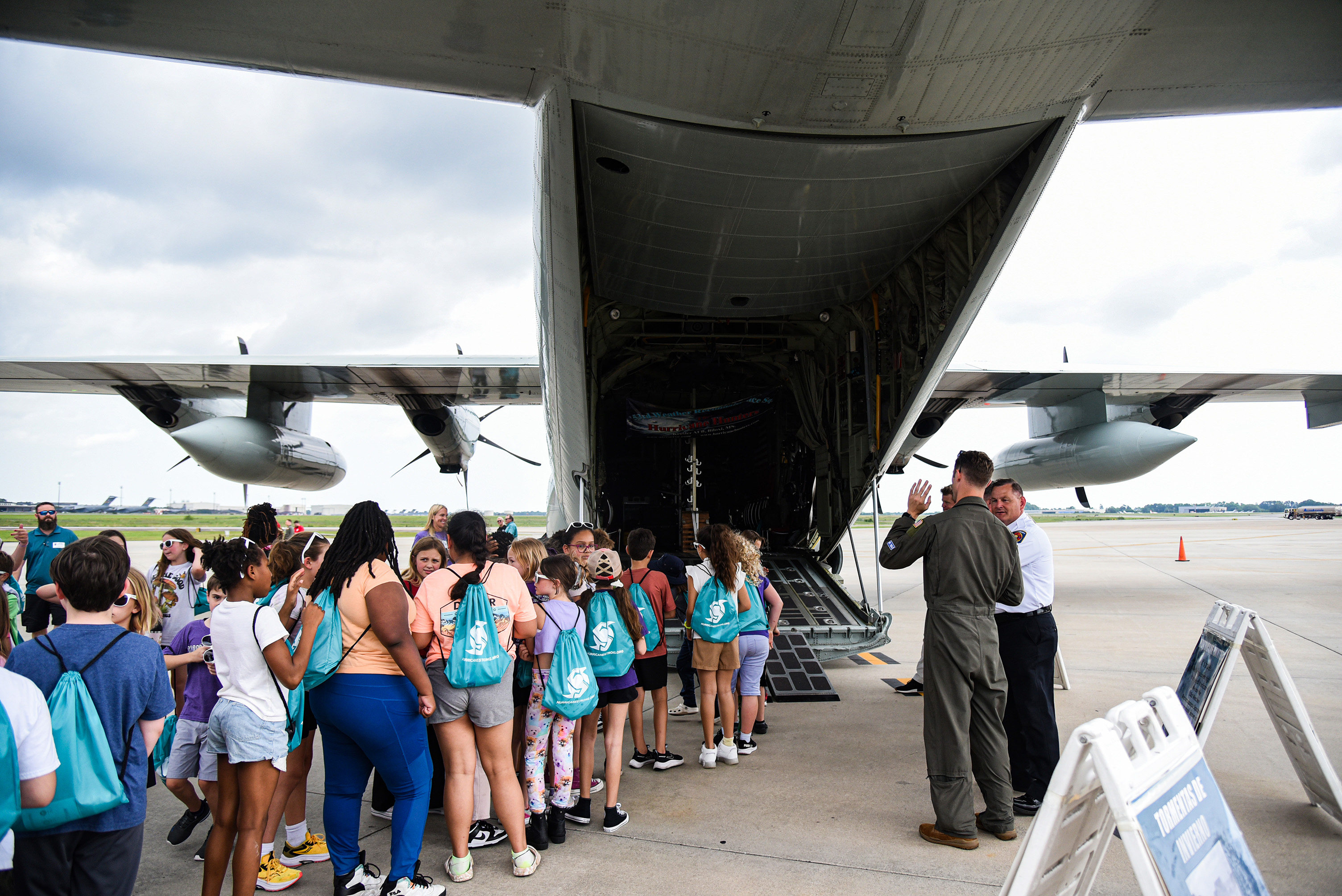 students walking into aircraft