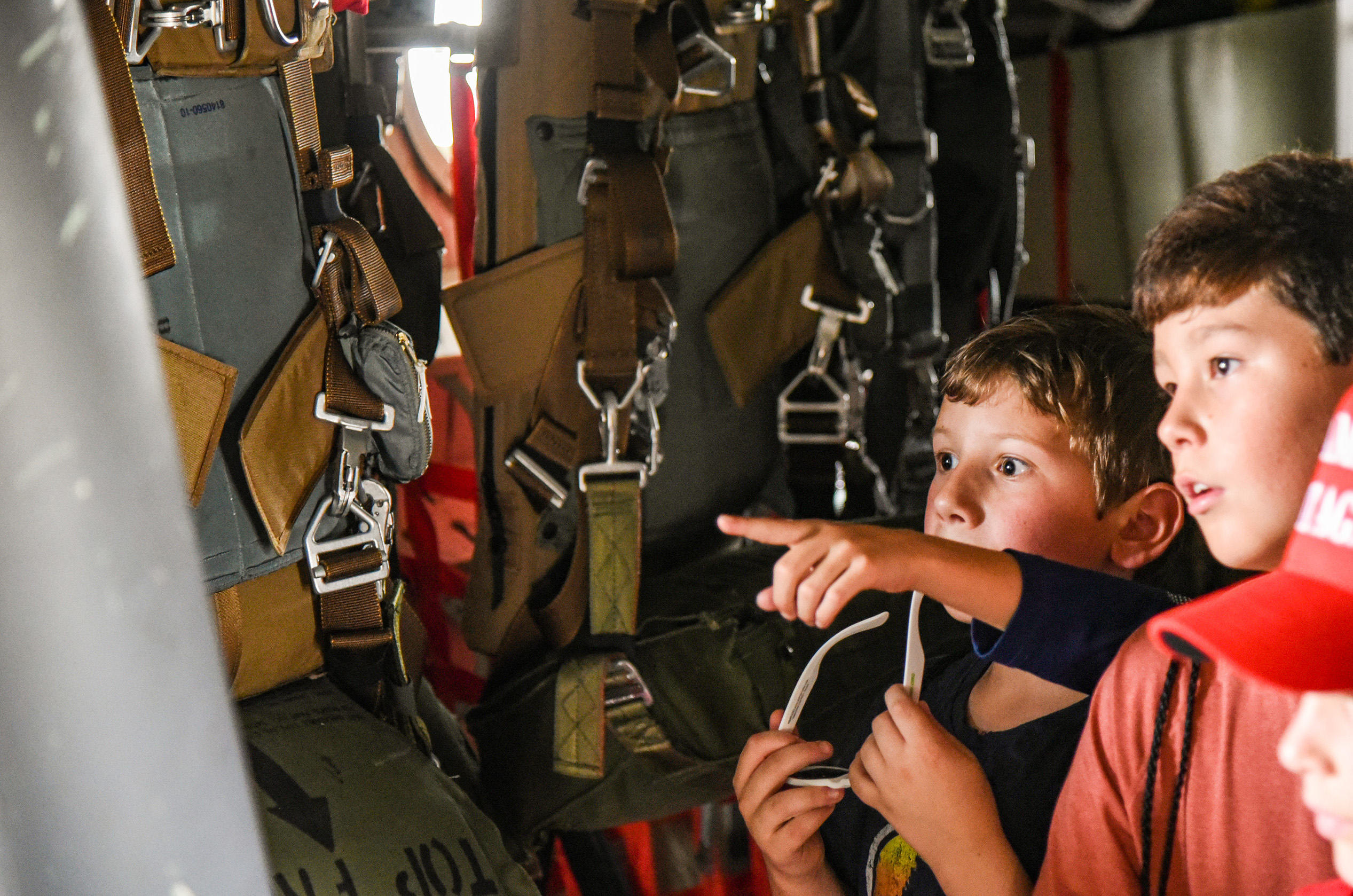 students walking through aircraft
