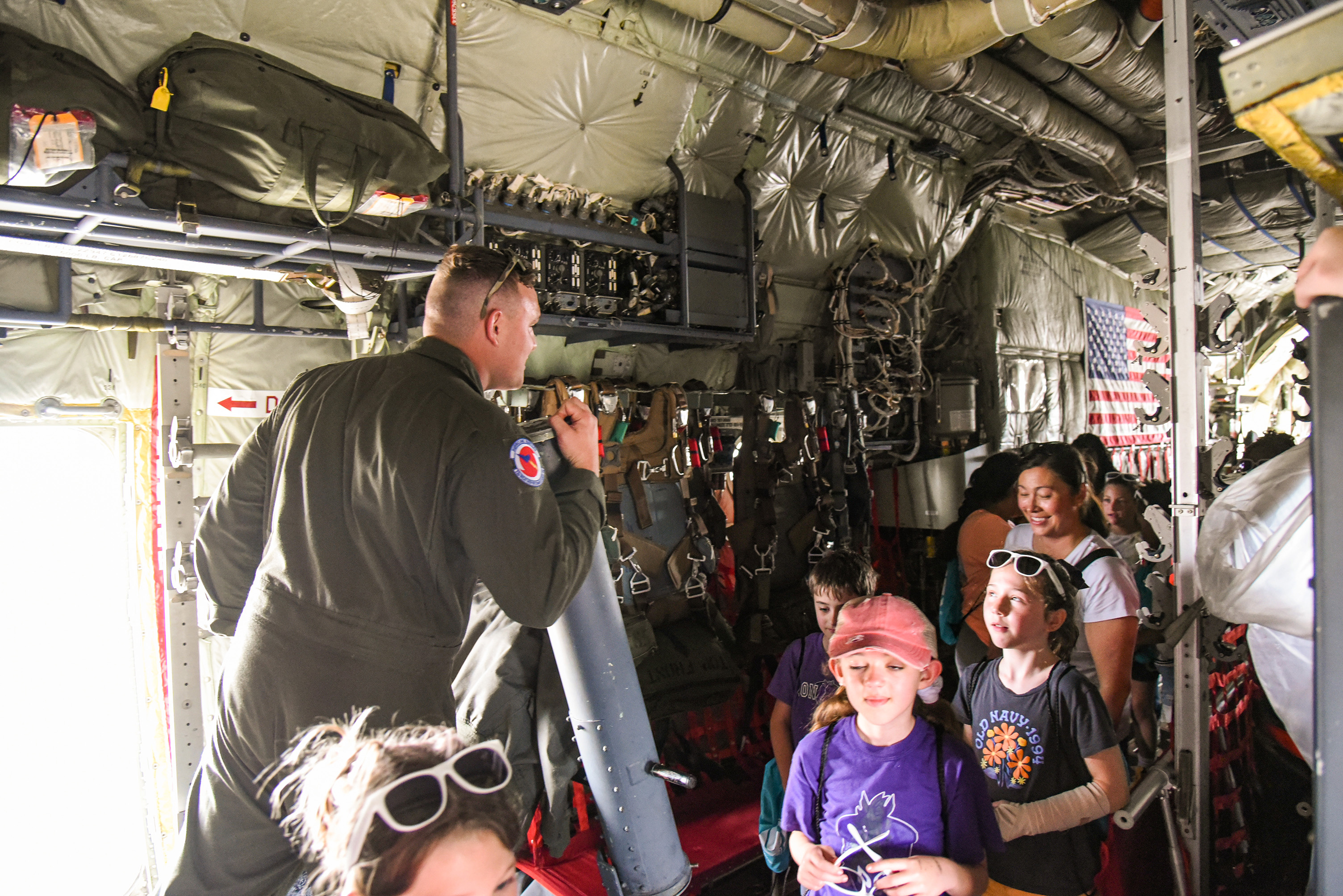 students walking through aircraft