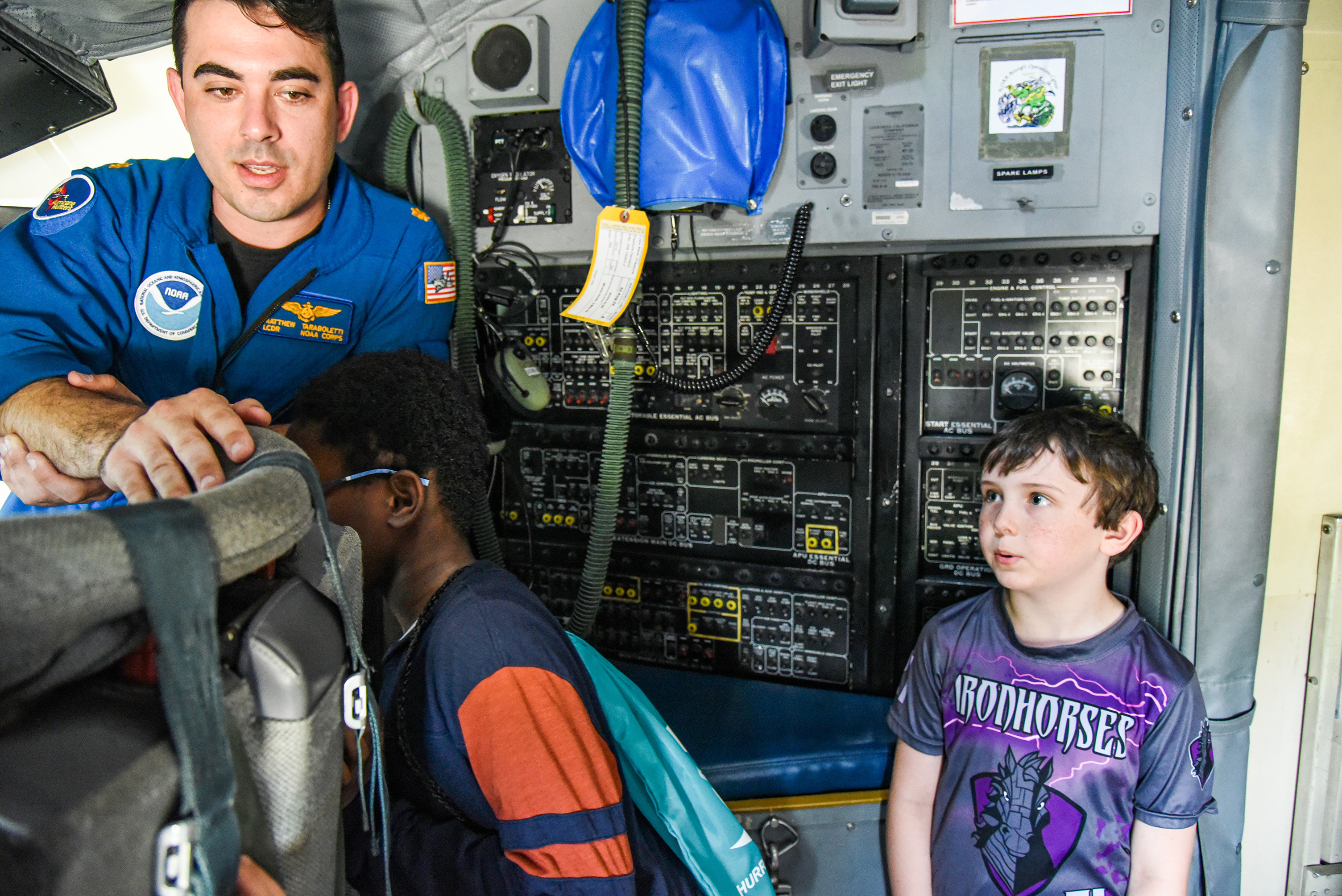 students walking through plane