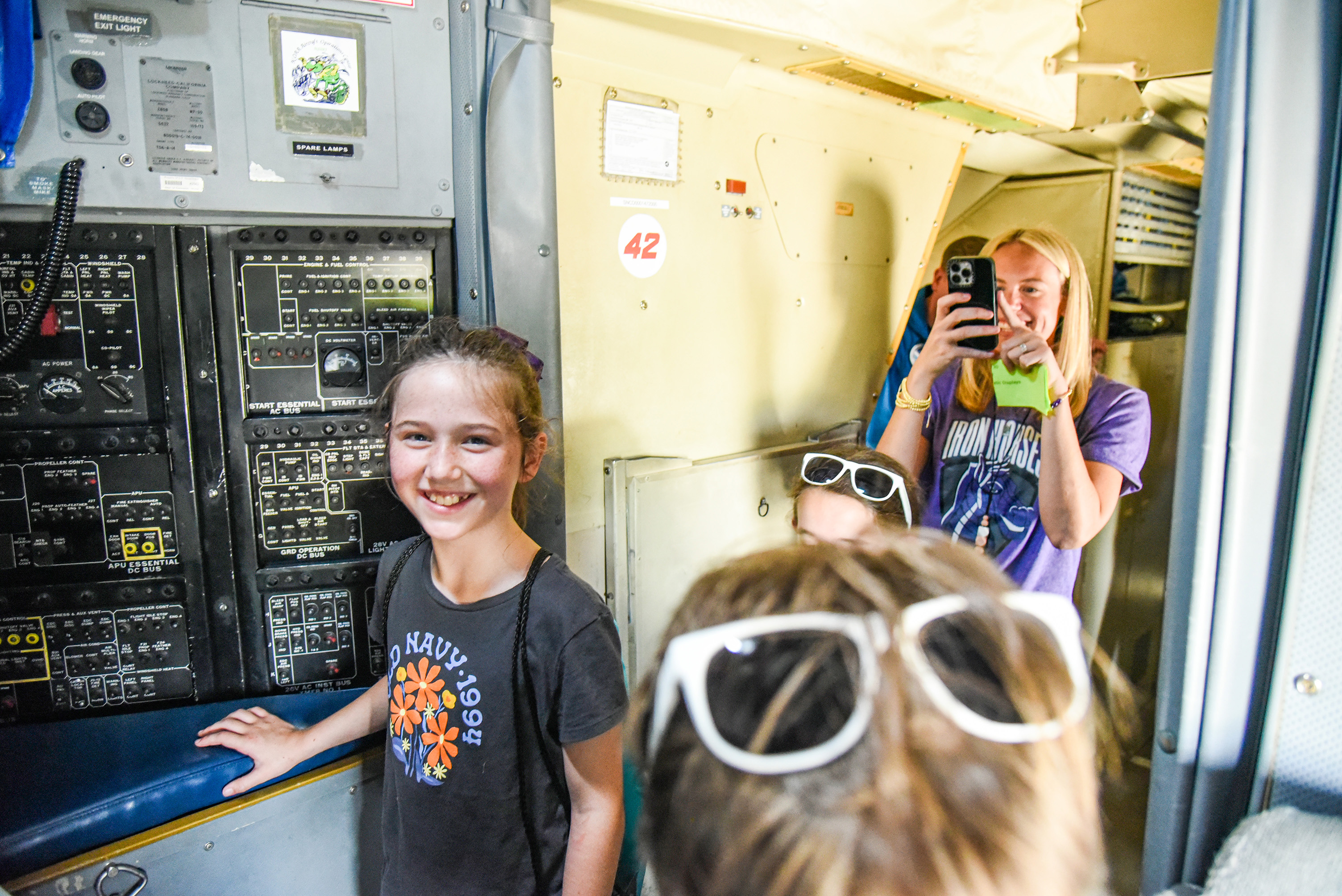 students walking through plane