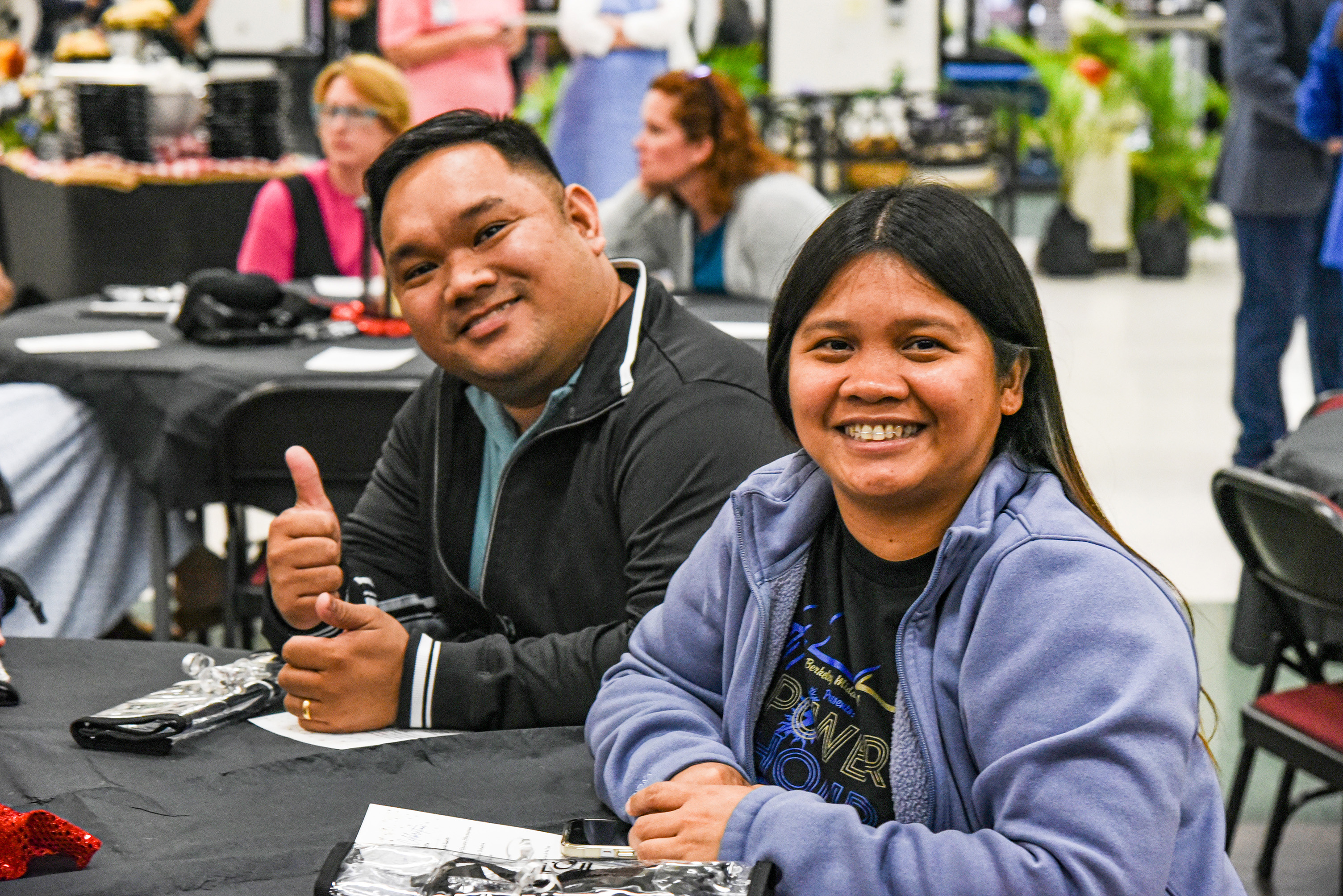 teachers smiling at table
