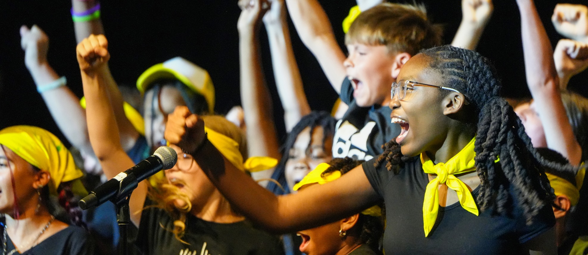 child singing passionately