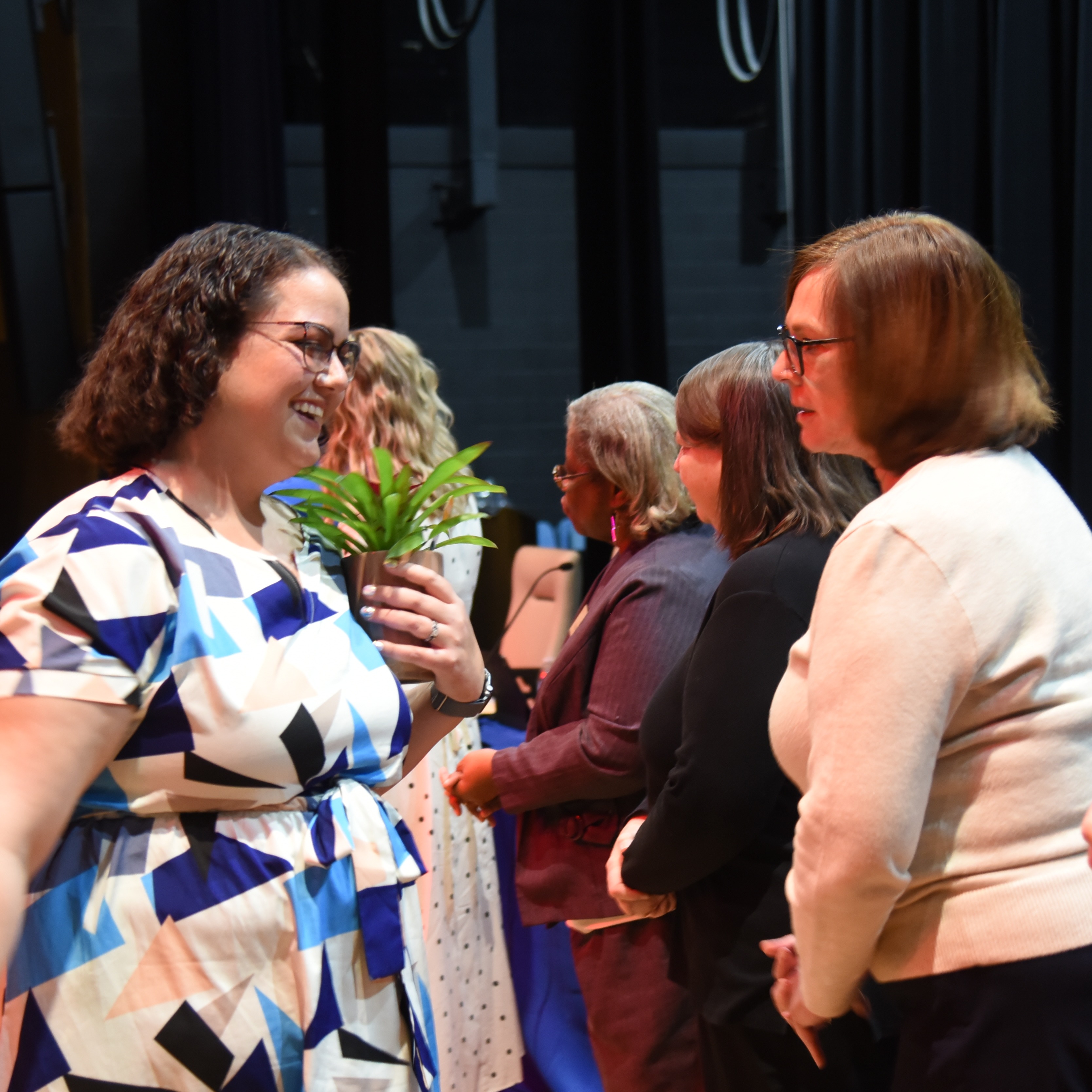 Top 8 Teacher of the Year with board member