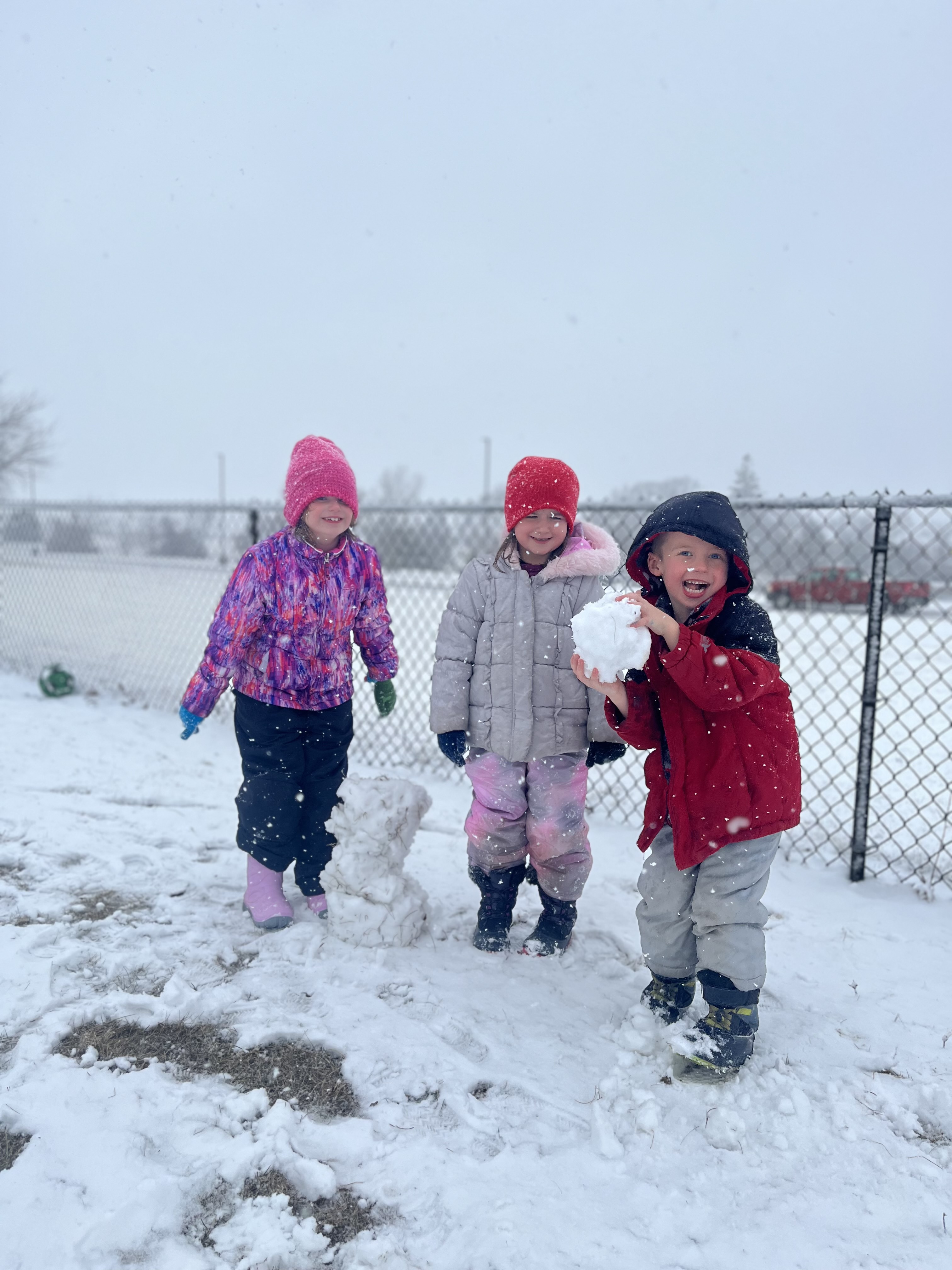 students at recess in winter