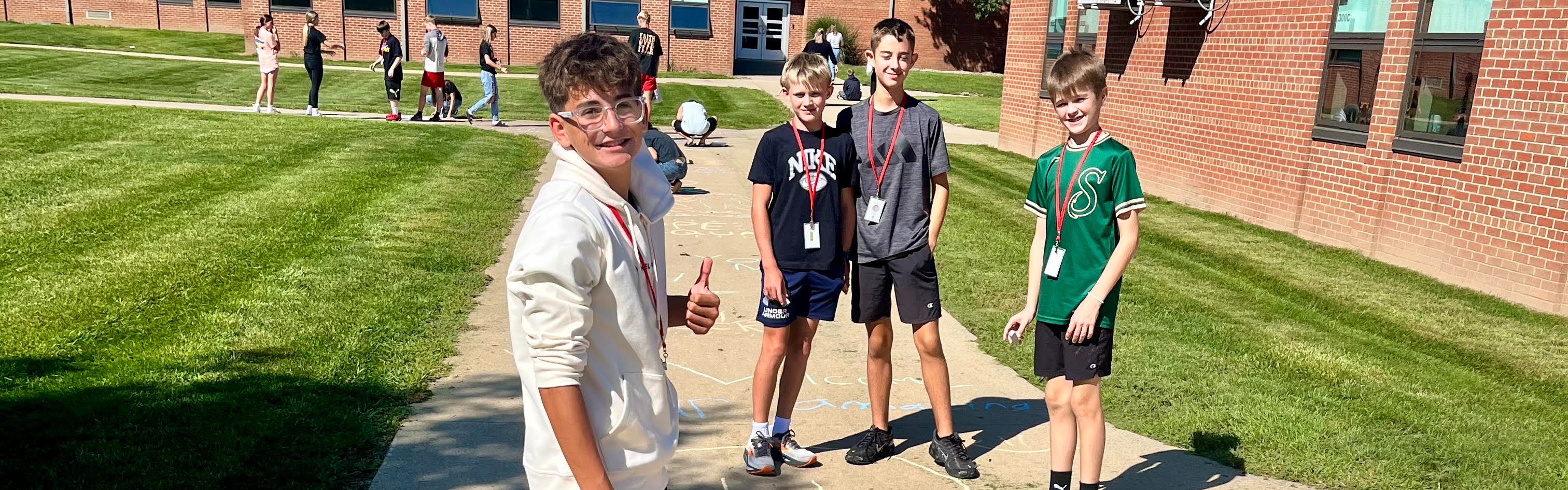 Students Drawing on Sidewalks with Chalk