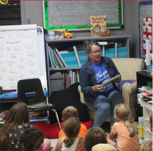 Teacher reading to students