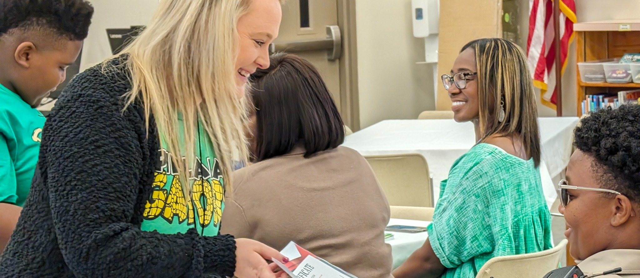 Principal Deese hands Corporal Ivey a Certificate of Appreciation at our Veteran's Day Program.