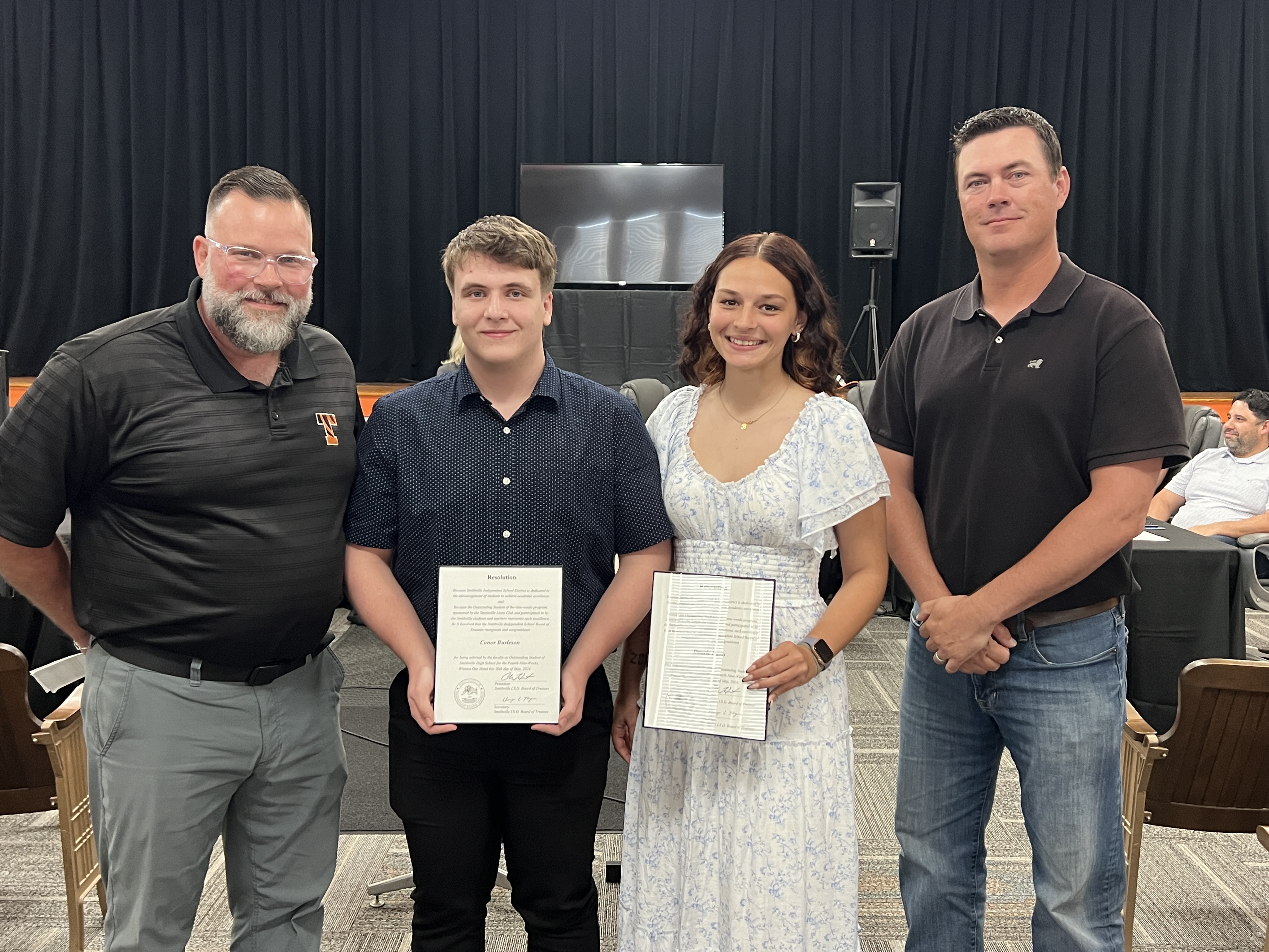 students with certificates at the Board Meeting