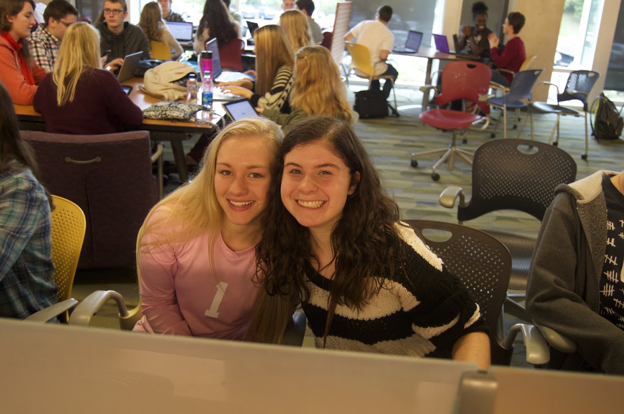 Two girls smiling to camera