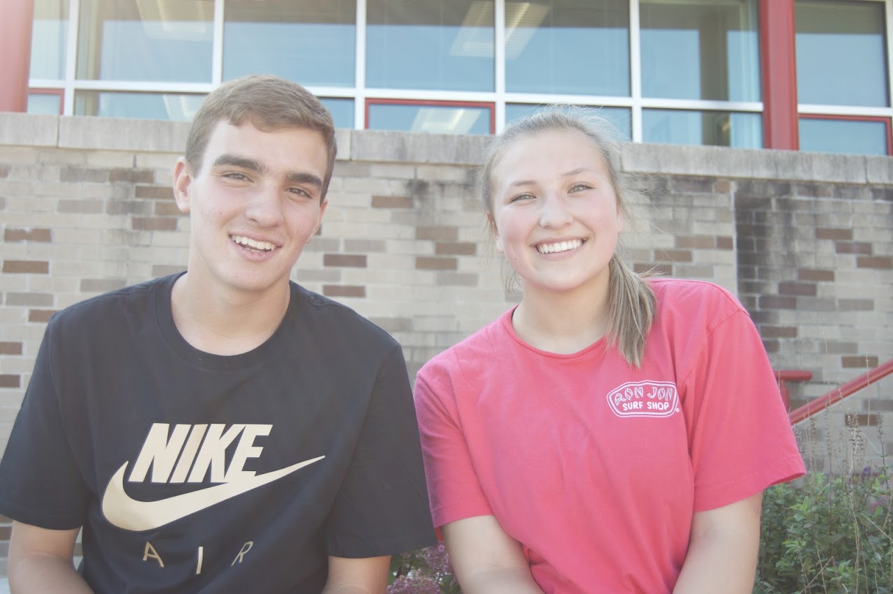 Two kids smiling to camera