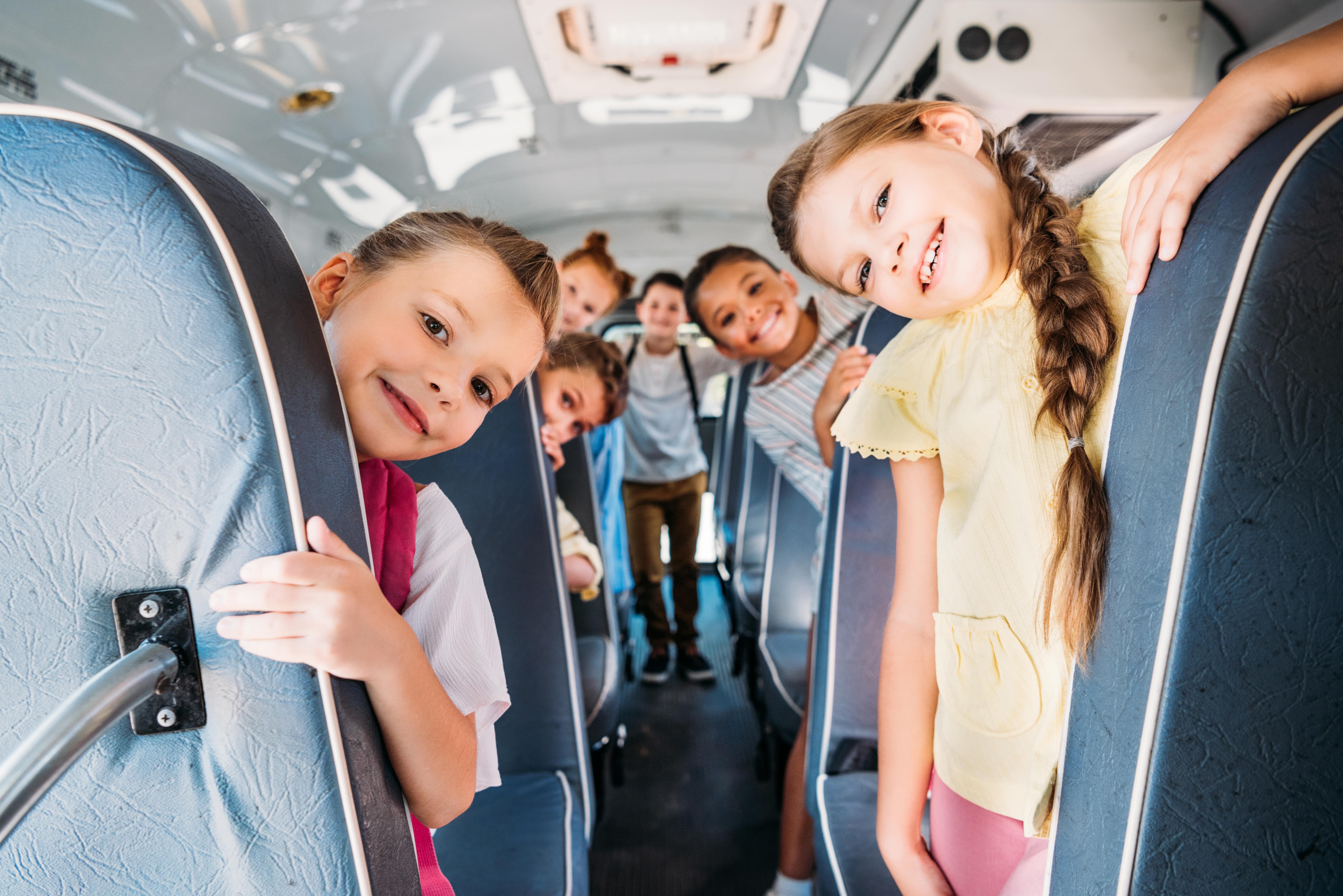 Student boarding a school bus