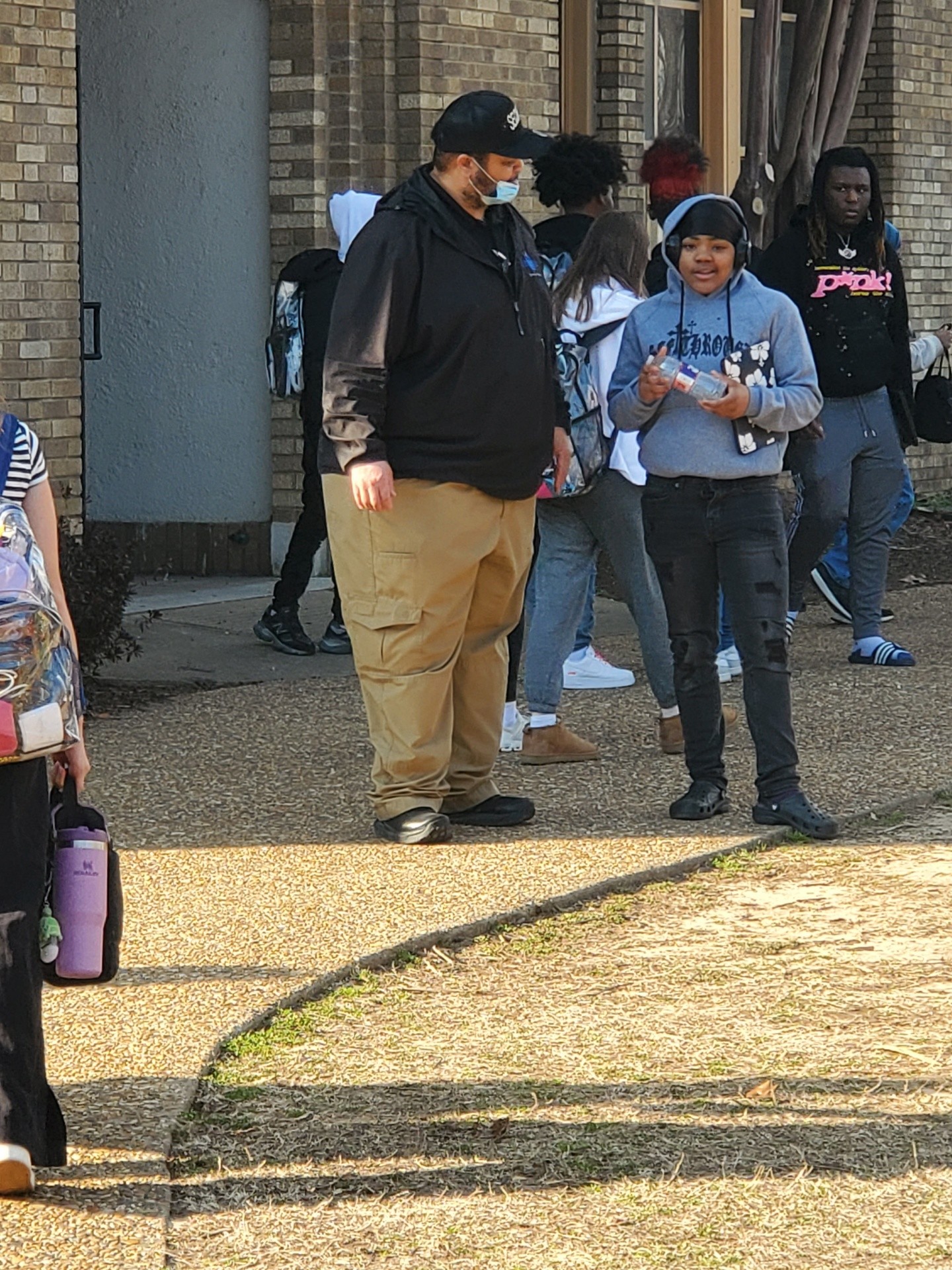 security talking to students