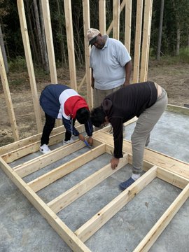 students framing walls