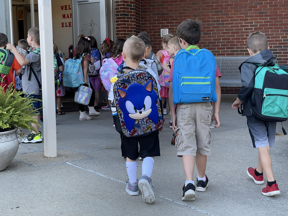photo of students with backpacks