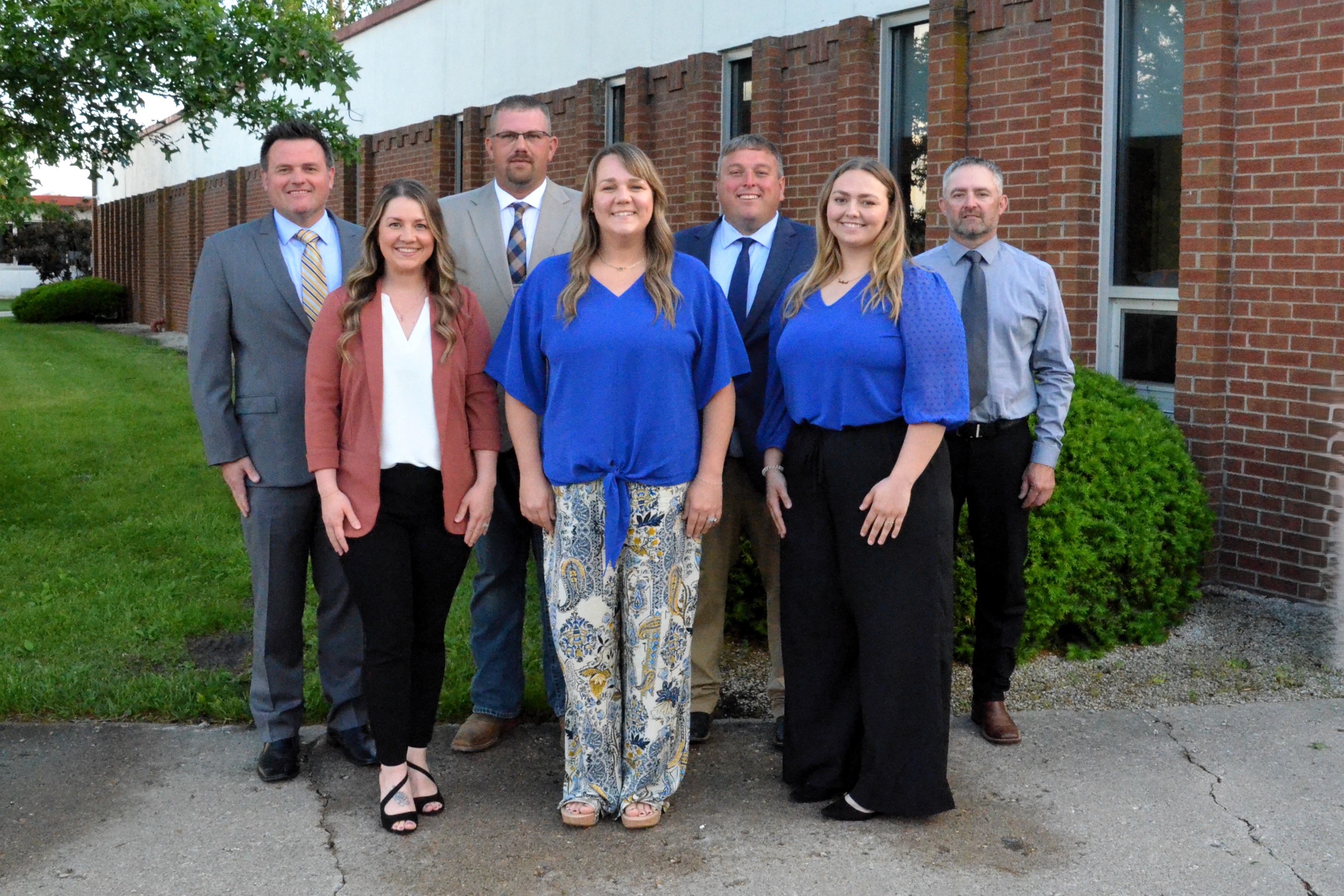 Photo of Shiloh school board members outside building May 2025