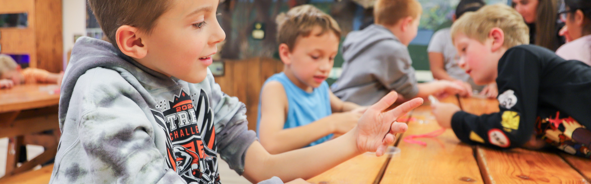 student learning about worms