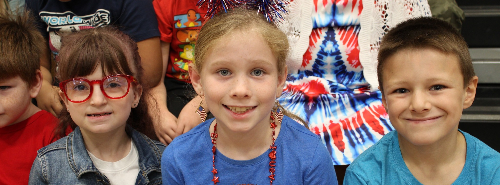 photo of three students in patriotic clothing