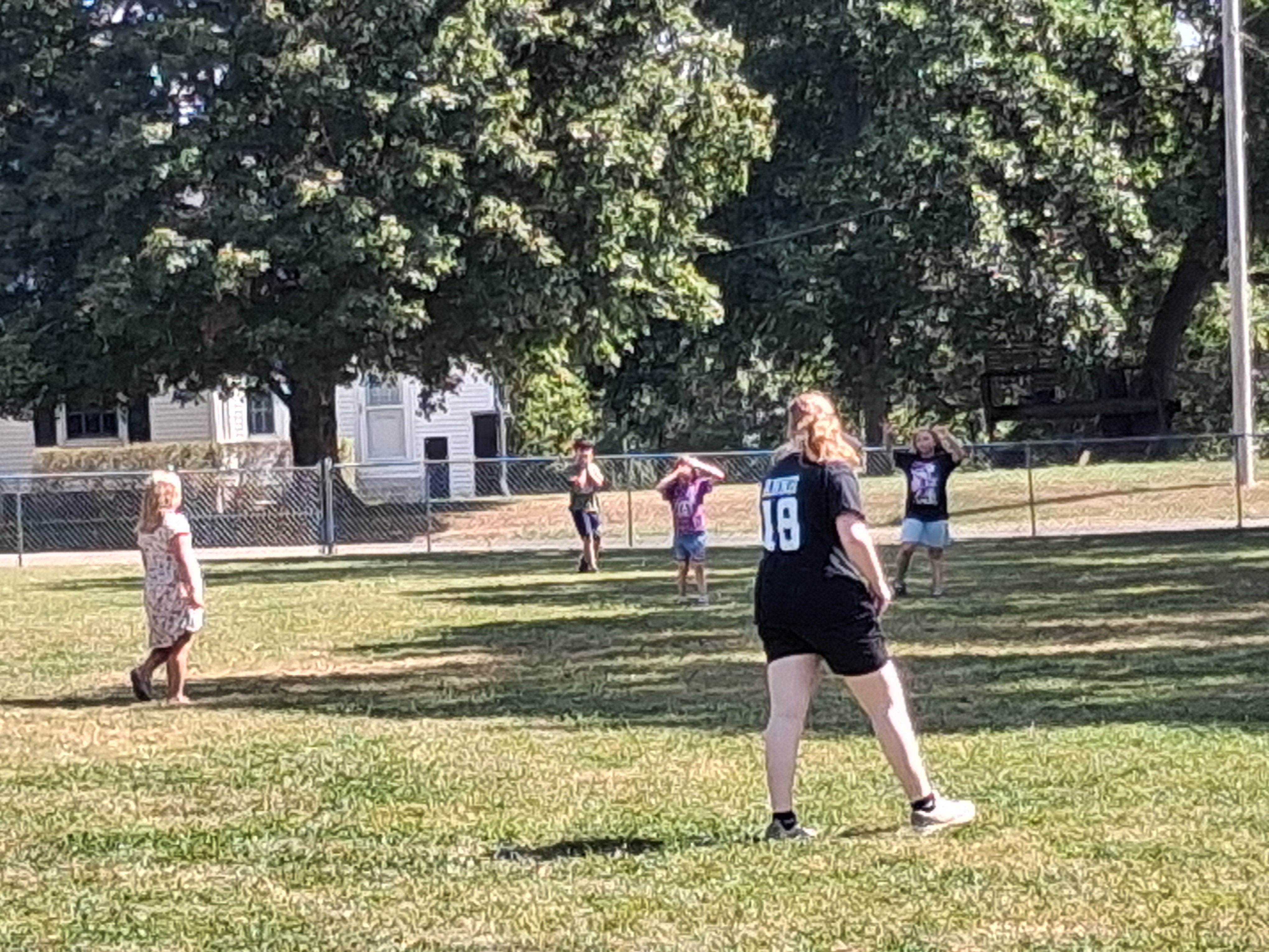 High school students with Elementary kids outside