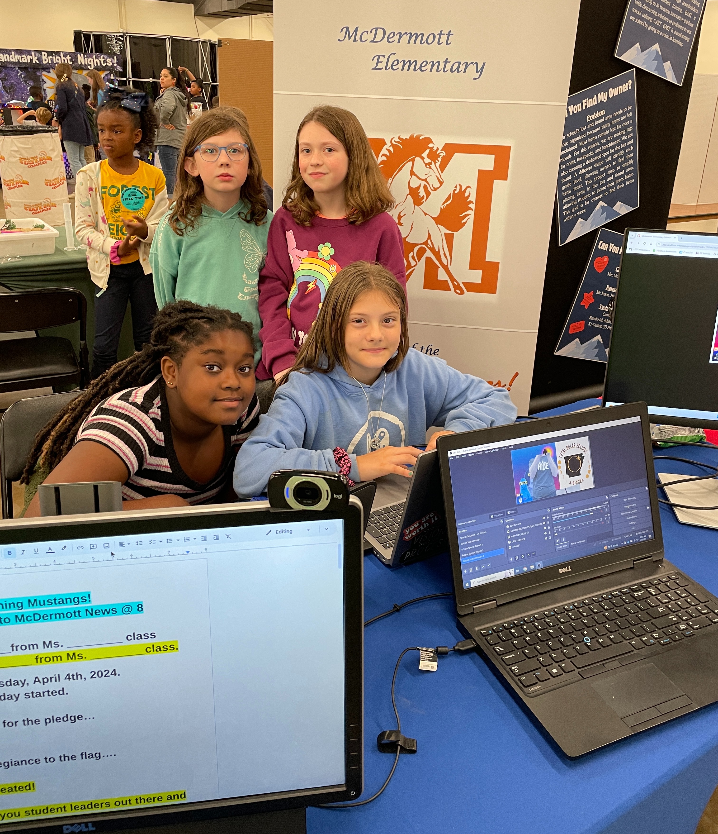 Students working the news station