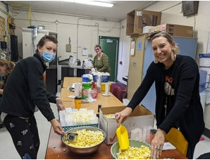 Staff prepping popcorn