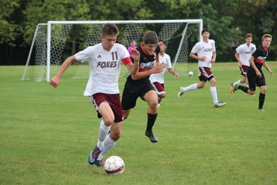 Boys playing soccer