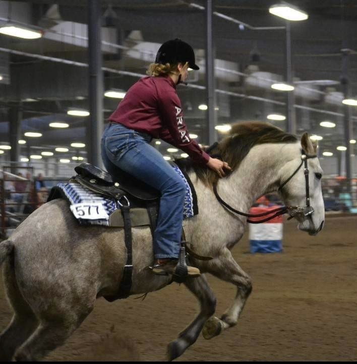 Girl riding a horse