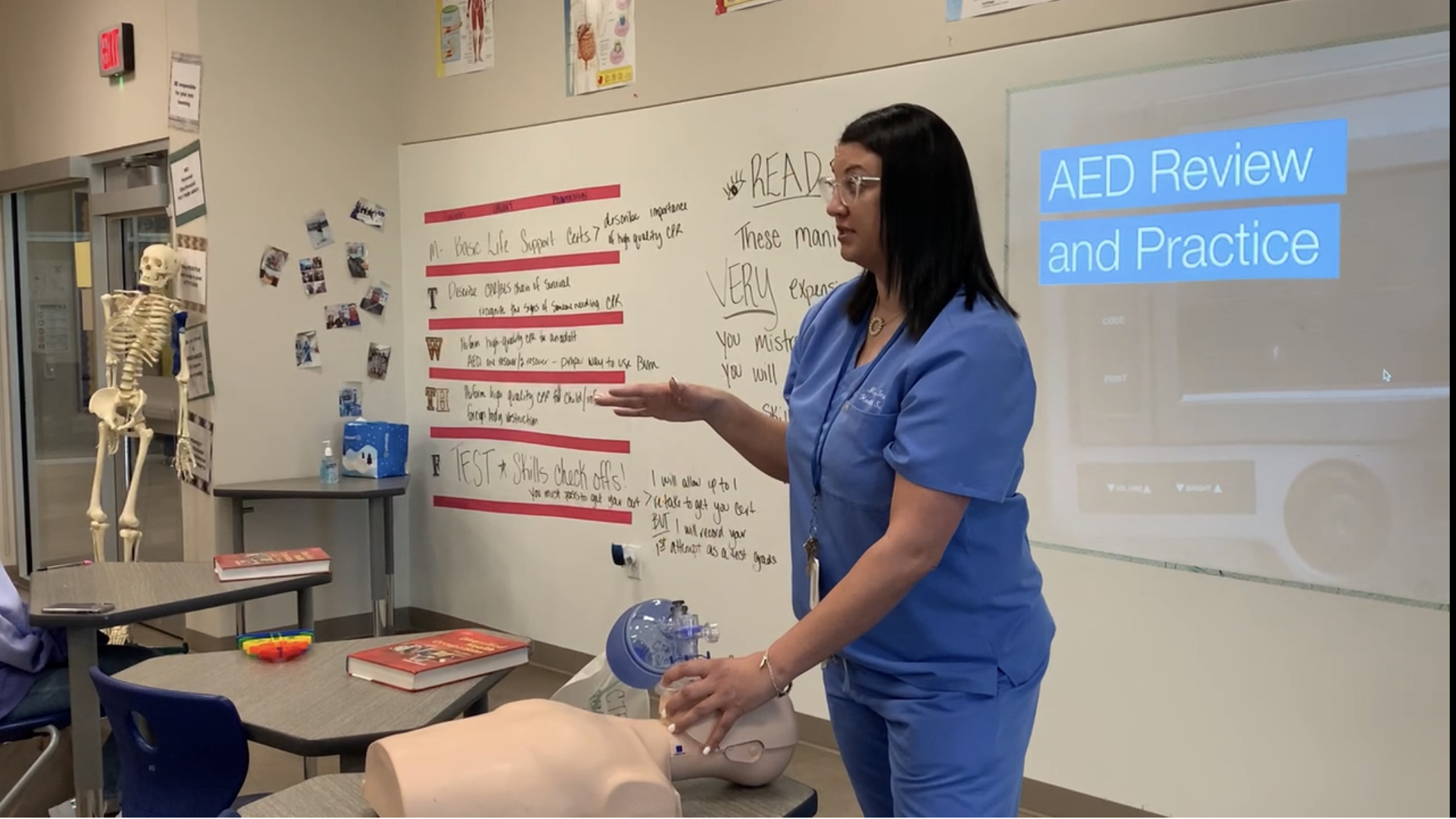 Mrs.Stanfill teachers the Health Science Technology students a lesson on AEDs.