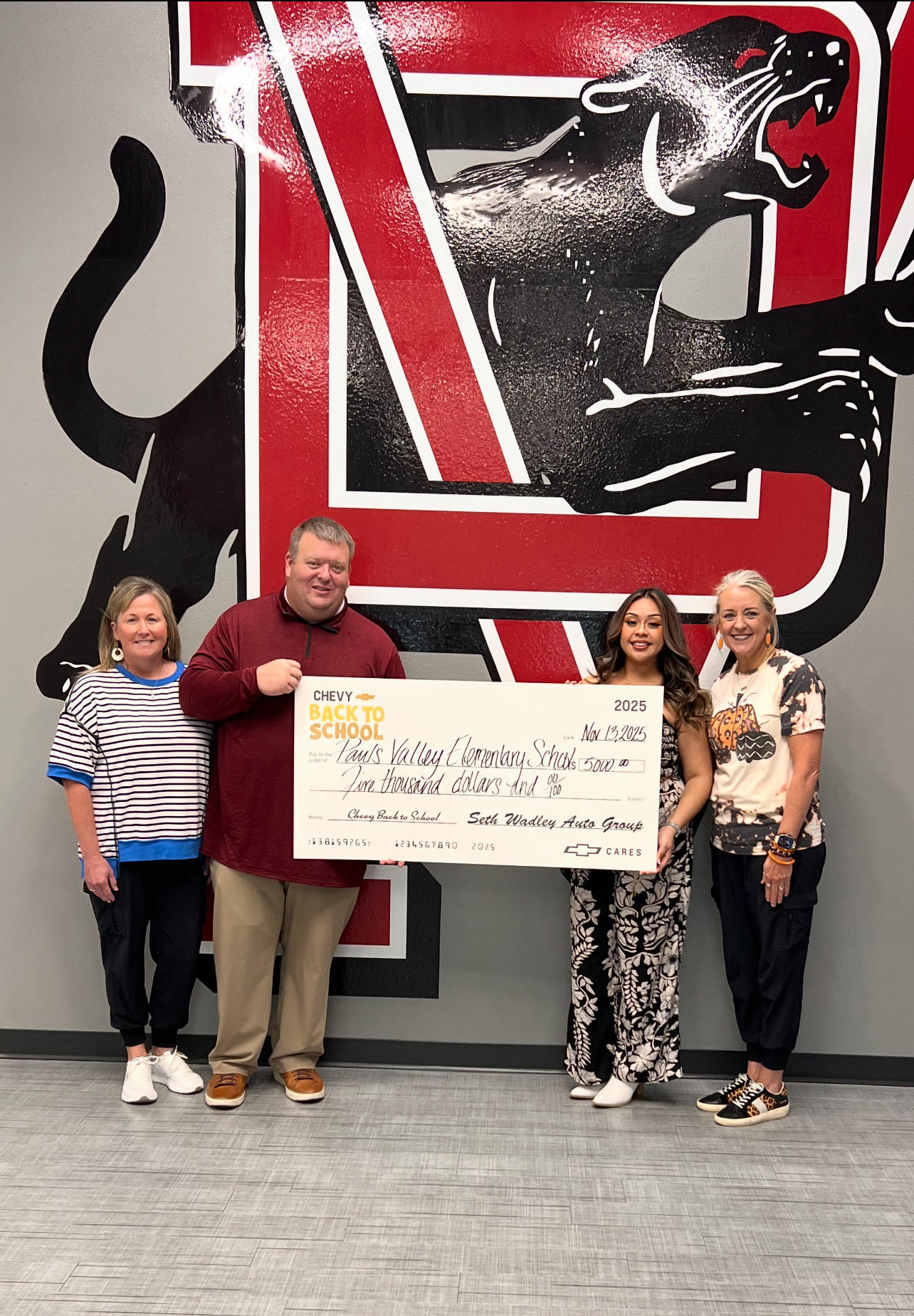 Seth Wadley Donation to PVES posed picture