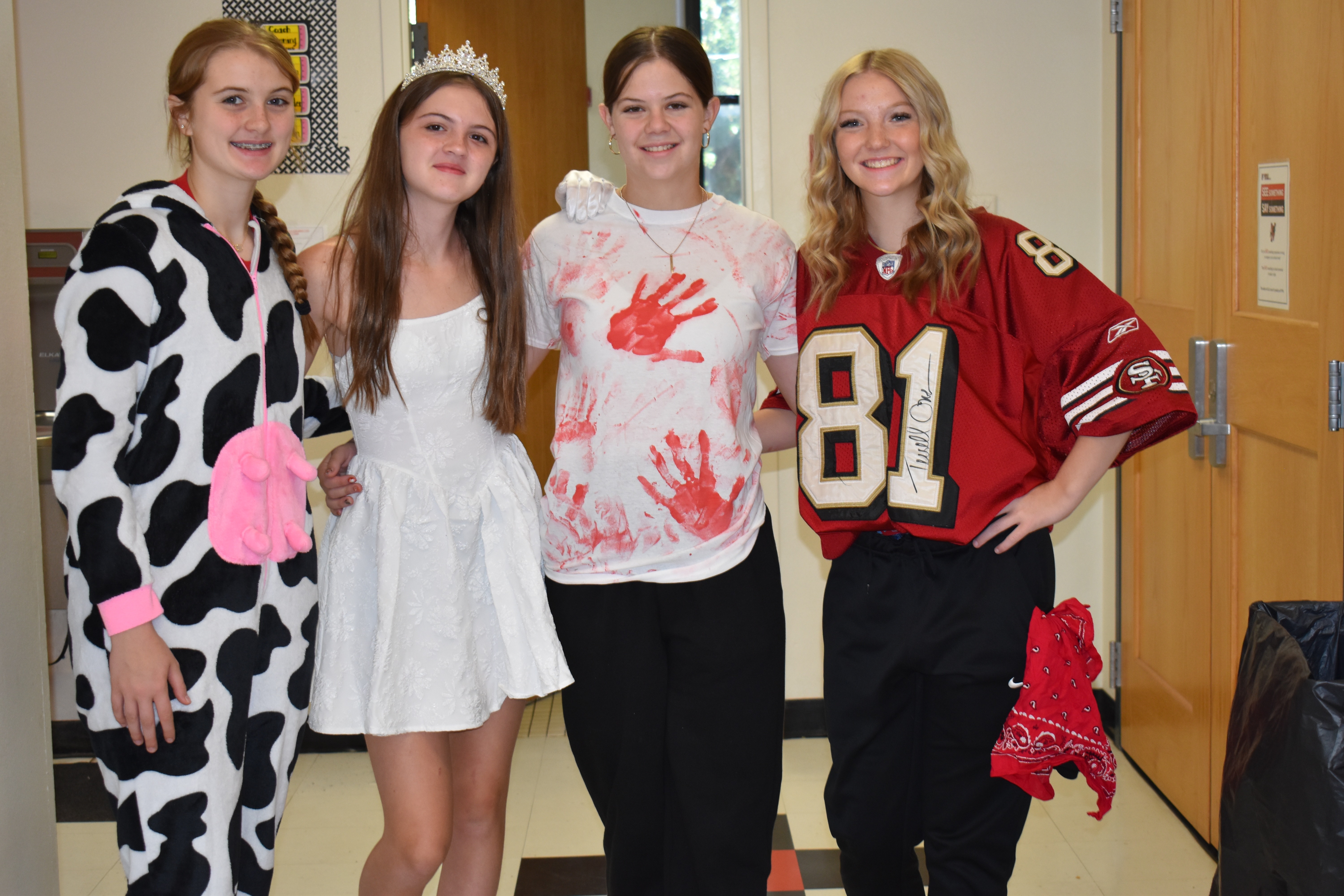 students and staff pose for photos