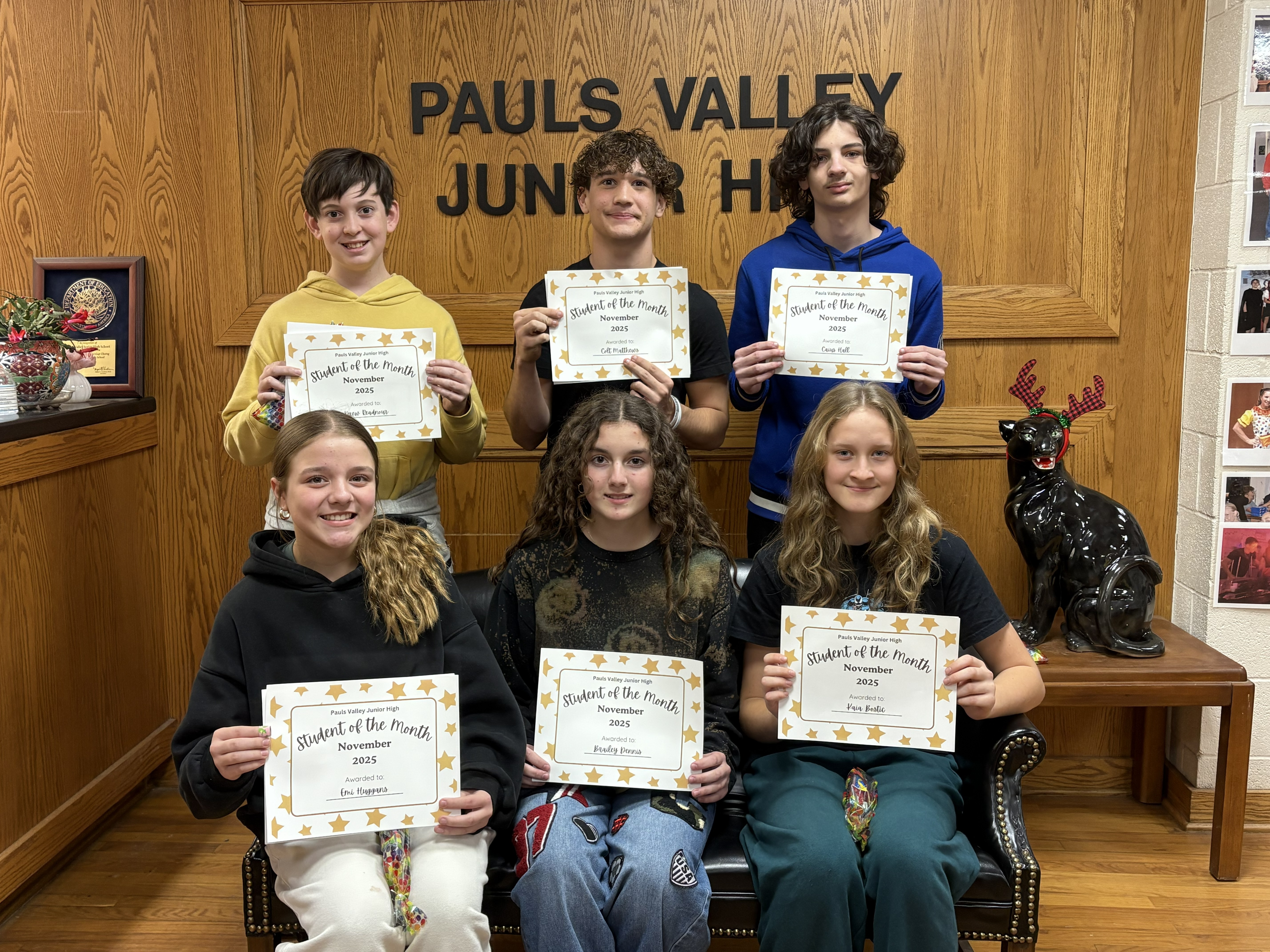 November students of the month pose for a picture