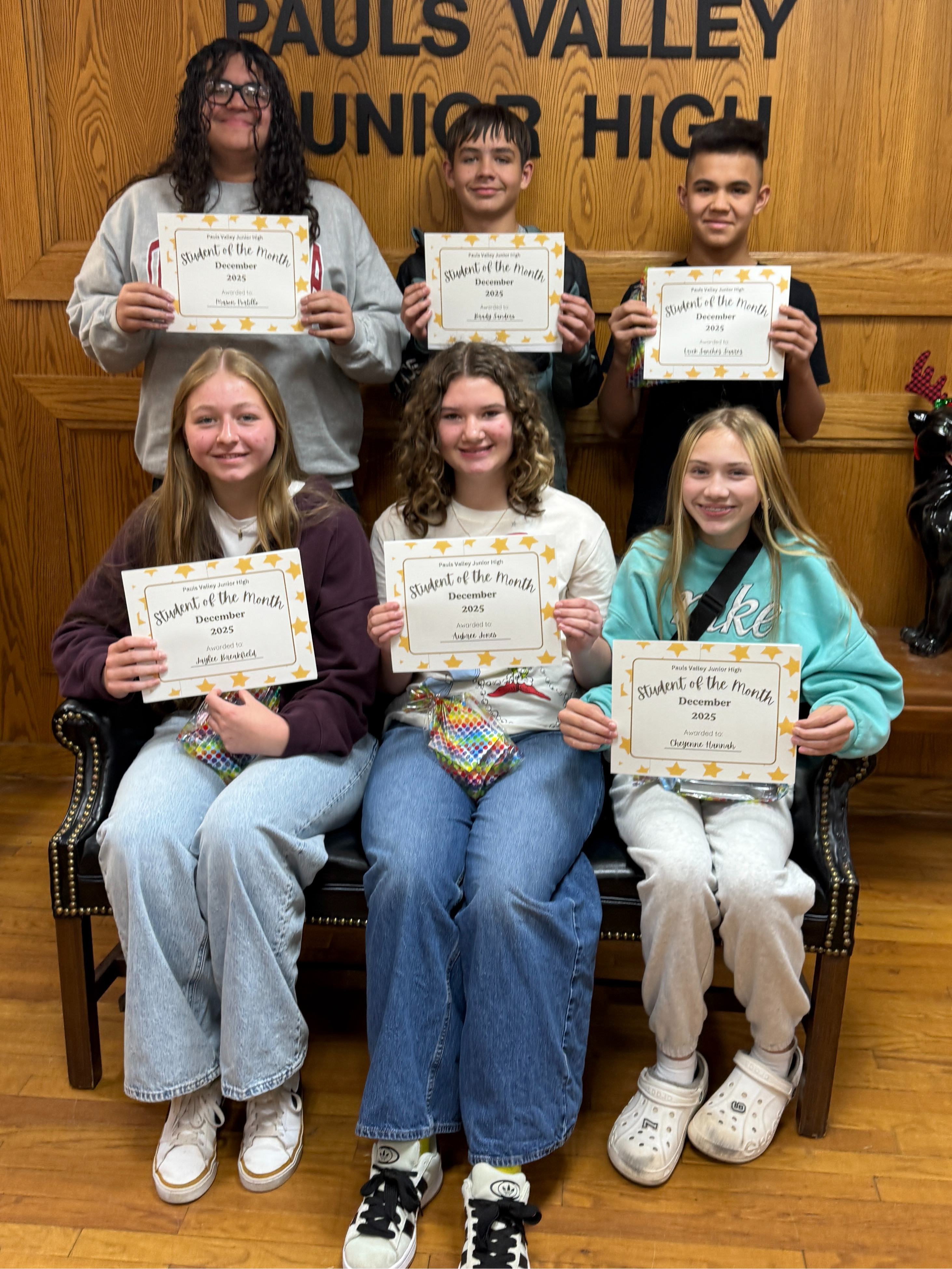December Students of the month pose together